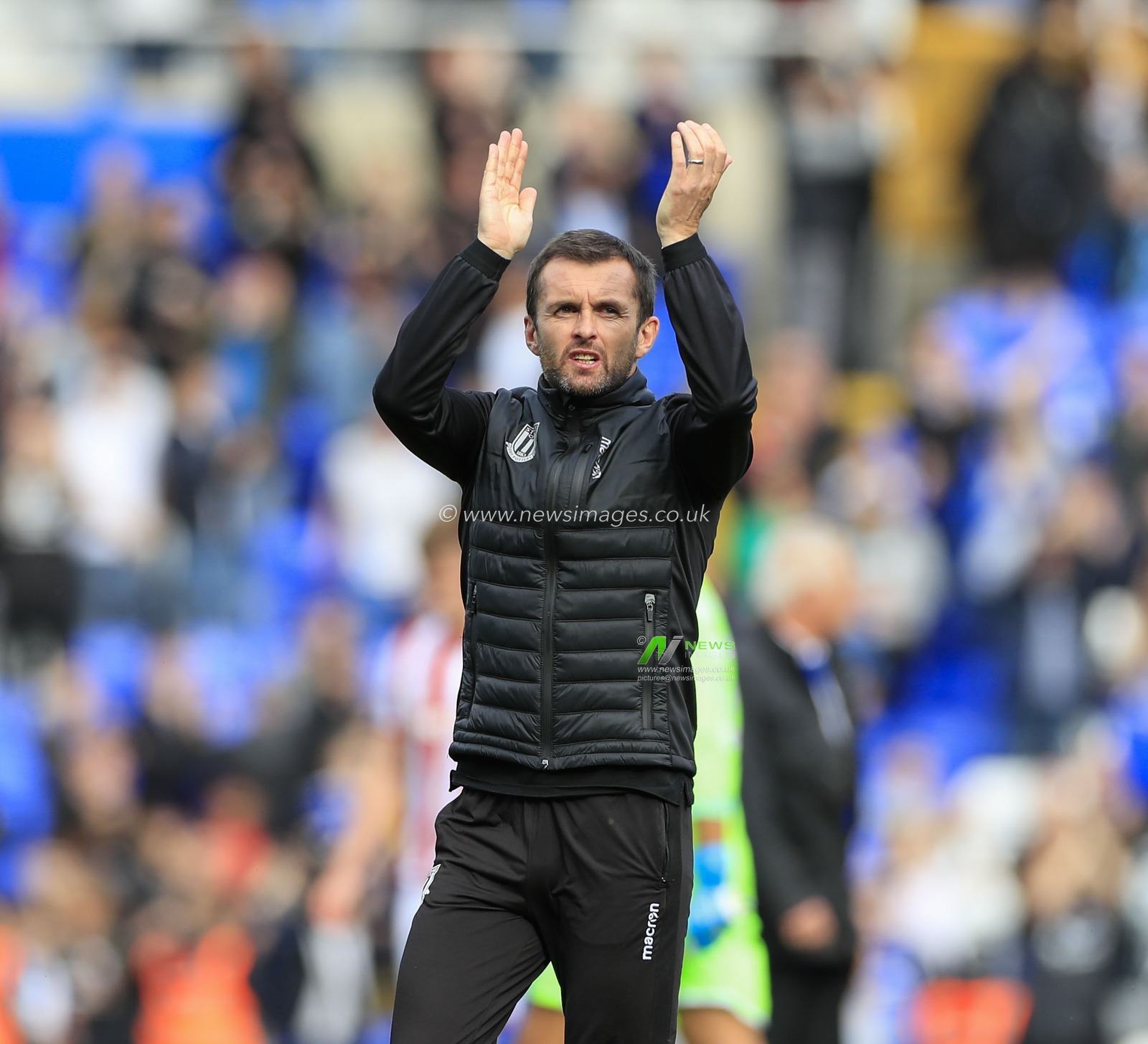 31st August 2019, St Andrew's, Birmingham, England; Sky Bet Championship Football,  Birmingham City vs Stoke City ; Stoke City manager Nathan Jones applauds the fans at the end of the game

Credit: Conor Molloy/News Images


English Football League images are subject to DataCo Licence