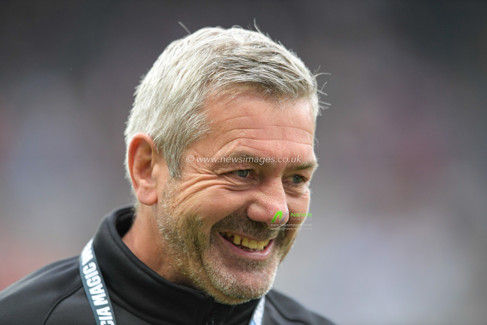 Daryl Powell Head Coach of Castleford Tigers smiles after seeing his side beat Salford Red Devils 29-18