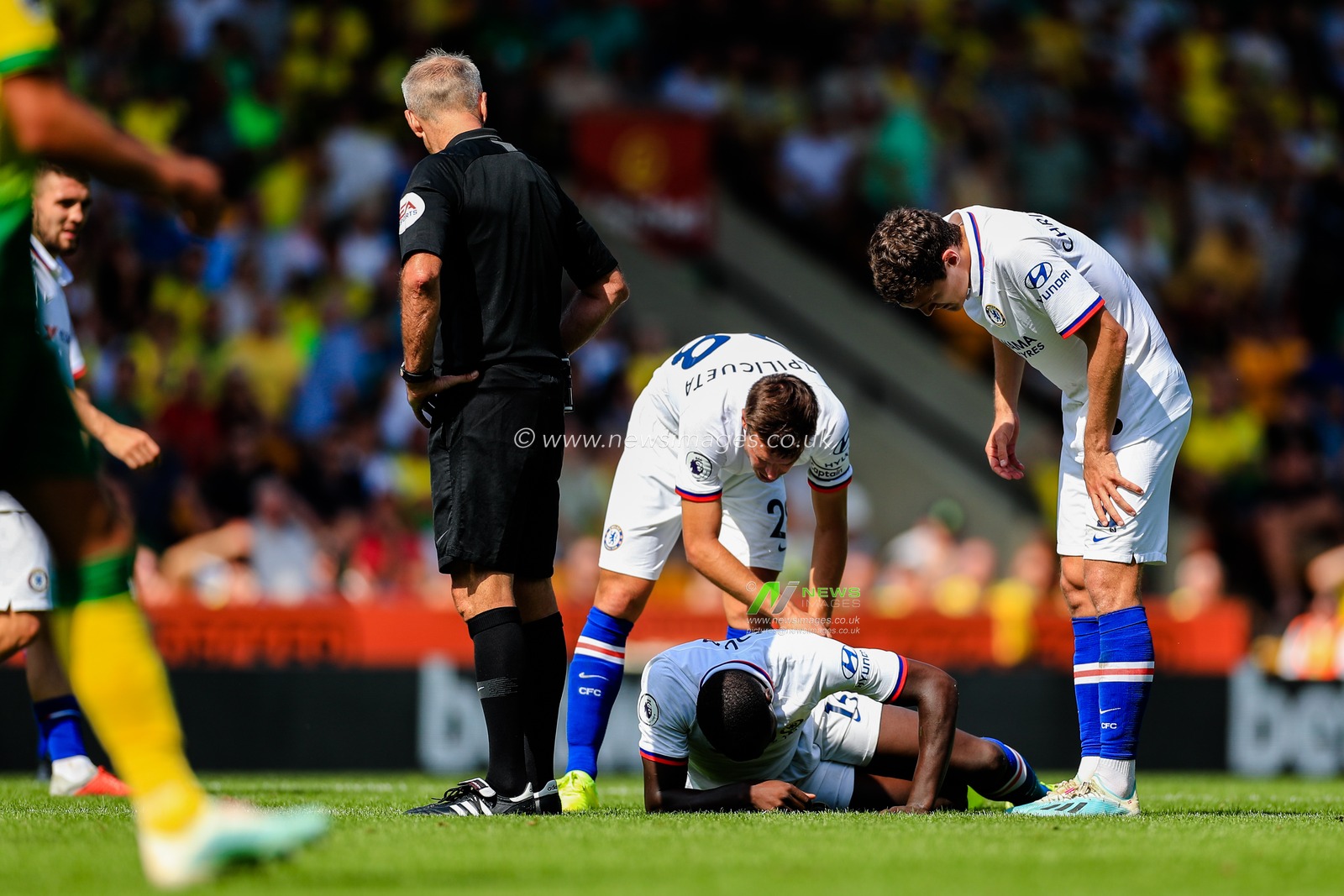 24th August 2019, Carrow Road, Norwich, England ; Premier League Football, Norwich City vs Chelsea  : Kurt Zouma (15) of Chelsea lies injured on the pitch


Credit: Georgie Kerr/News Images


Premier League/EFL Football images are subject to DataCo Licence