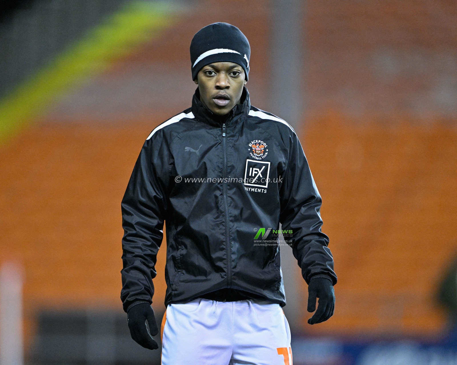 Karamoko DembÃ©lÃ© of Blackpool warms up ahead of the match, during the Bristol Street Motors Trophy Quarter Final match Blackpool vs Bolton Wanderers at Bloomfield Road, Blackpool, United Kingdom, 30th January 2024

(Photo by Cody Froggatt/News Images)