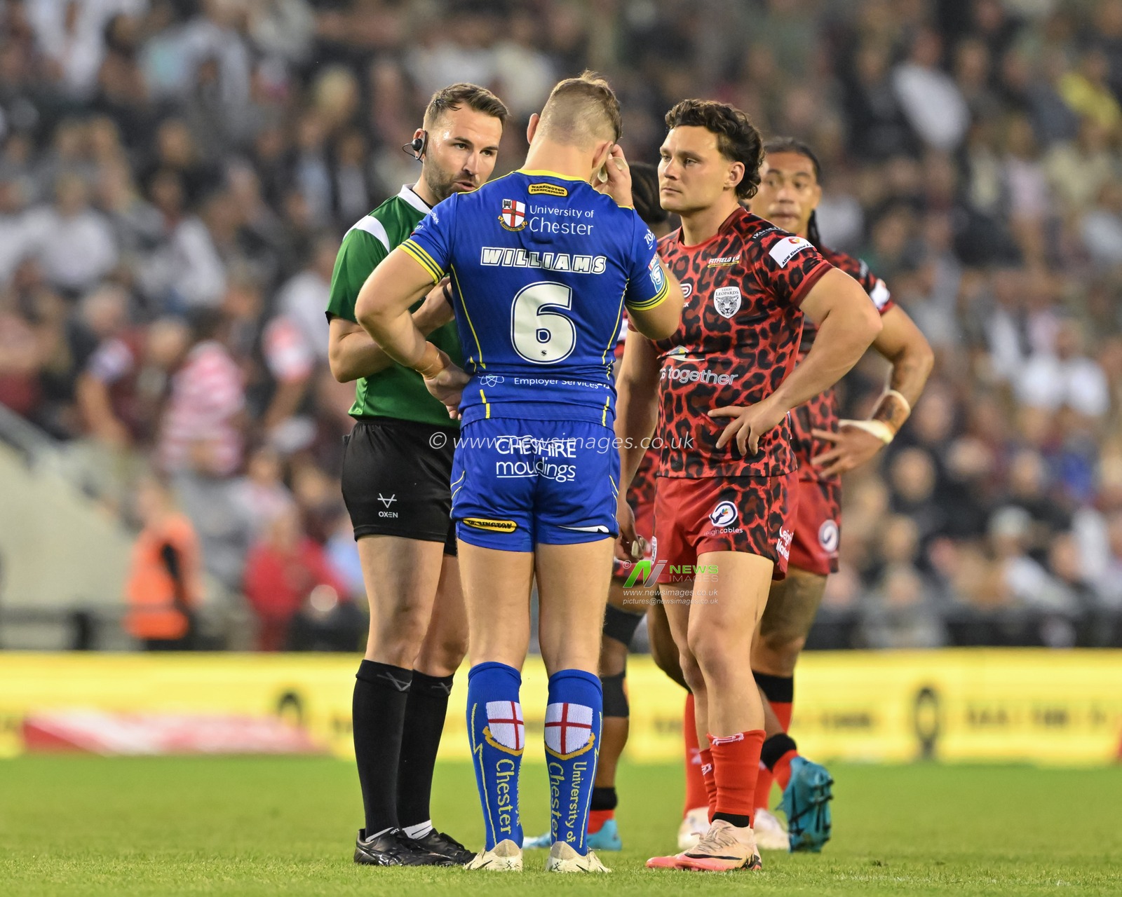 Referee Chris Kendall speaks with George Williams of Warrington Wolves and Lachlan Lam of Leigh Leopards during the Betfred Super League Round 24 match Leigh Leopards vs Warrington Wolves at Leigh Sports Village, Leigh, United Kingdom, 30th August 2024

(Photo by Cody Froggatt/News Images)