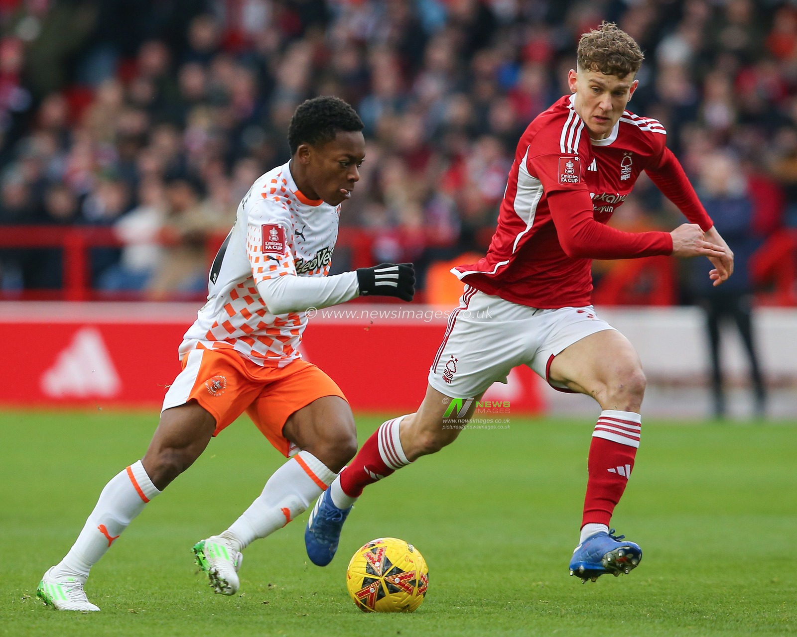 Karamoko DembÃ©lÃ© of Blackpool breaks with the ball during the Emirates FA Cup Third Round match Nottingham Forest vs Blackpool at City Ground, Nottingham, United Kingdom, 7th January 2024

(Photo by Gareth Evans/News Images)
