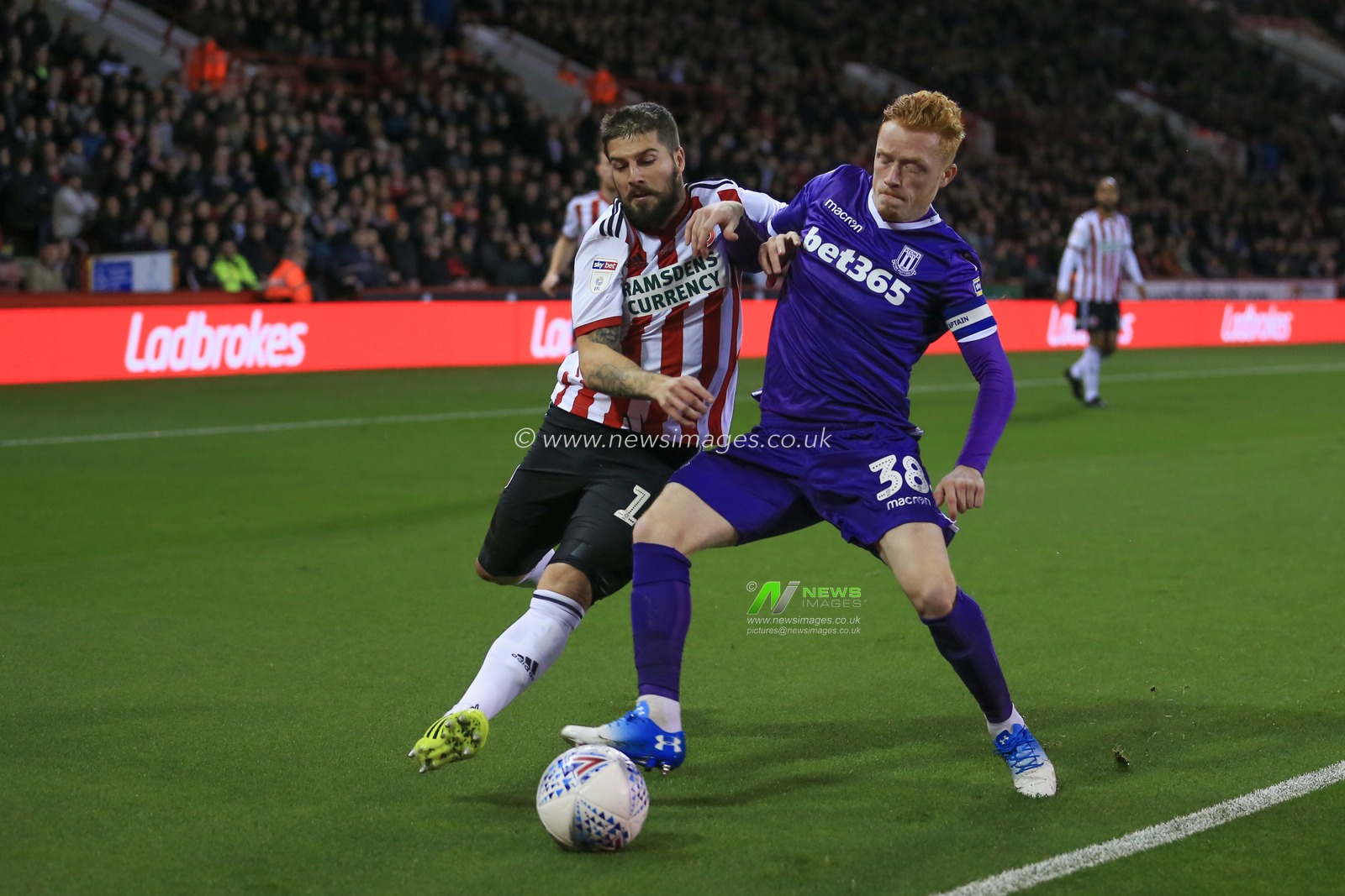 23rd October 2018, Bramall Lane, Sheffield, England; Sky Bet Championship, Sheffield United v Stoke City ; Ryan Woods (38) of Stoke City holds off Kieron Freeman (18) of Sheffield United 


Credit: Mark Cosgrove/News Images

English Football League images are subject to DataCo Licence