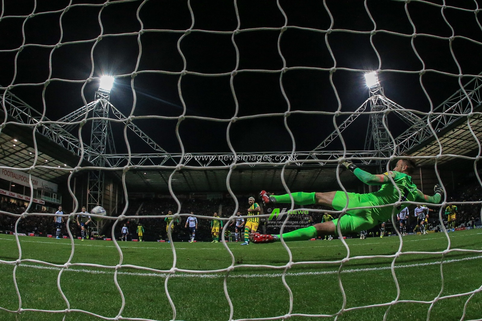 2nd December 2019, Deepdale, Preston, England; Sky Bet Championship, Preston North End v West Bromwich Albion : Charlie Austin (15) of West Bromwich Albion  scores a penalty to make it 0-1 

Credit: Mark Cosgrove/News Images