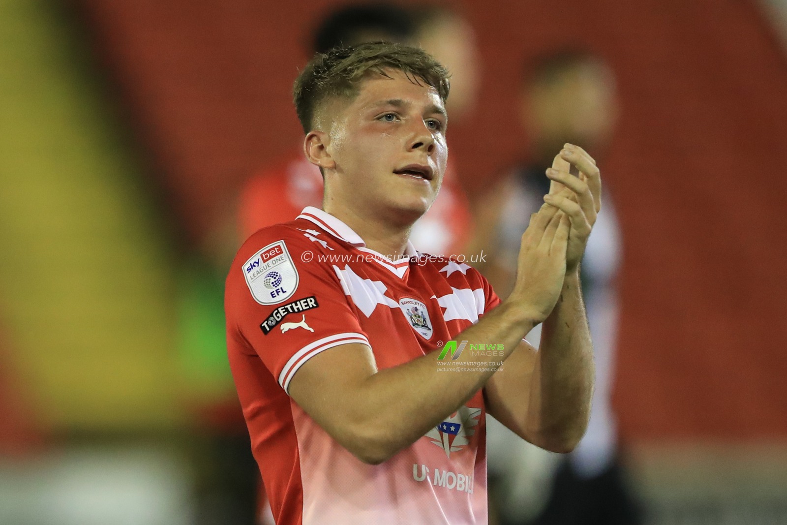 Aiden Marsh #19 of Barnsley applauds the home fans after winning 2-0 during the EFL Trophy match Barnsley vs Grimsby Town at Oakwell, Barnsley, United Kingdom, 5th September 2023

(Photo by Alfie Cosgrove/News Images)