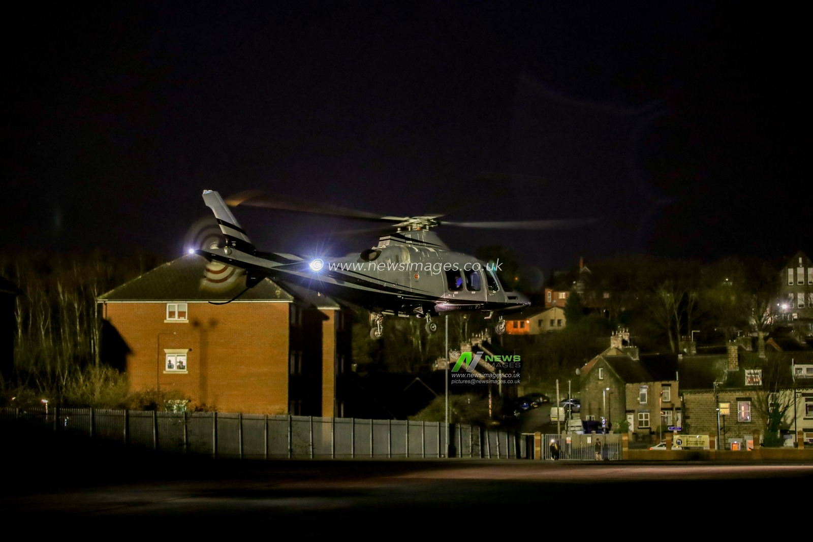 Peter Coates owner of Stoke City arrives at Oakwell by Helicopter