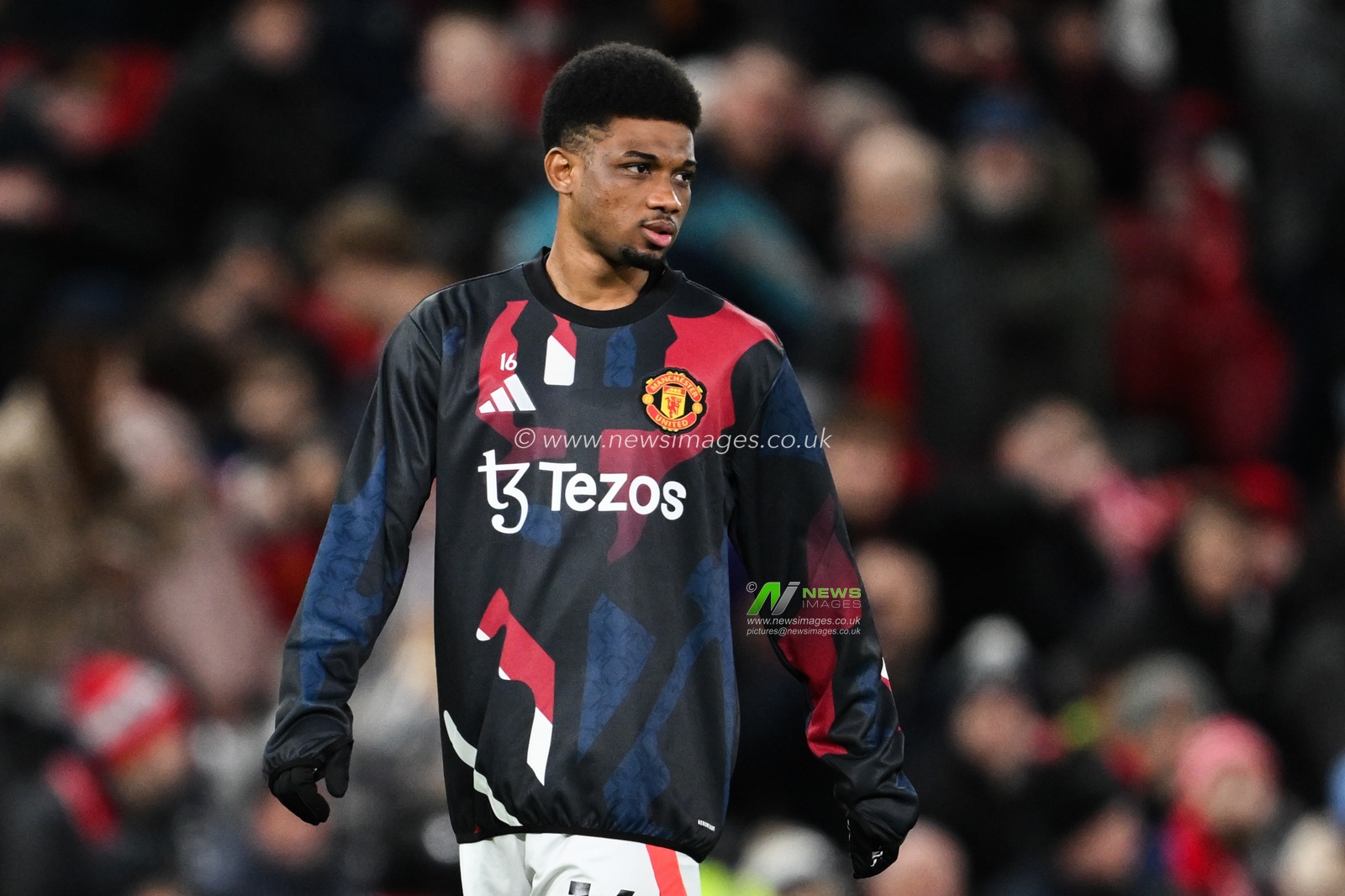 Amad Diallo of Manchester United during the pre-game warm up ahead of the Premier League match Manchester United vs Newcastle United at Old Trafford, Manchester, United Kingdom, 30th December 2024

(Photo by Craig Thomas/News Images)
