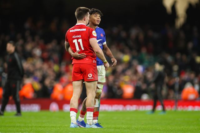 Josh Adams of Wales and Theo Attissogbe of France embrace at the final whistle during the Guinness Six Nations match Wales vs France at Principality Stadium, Cardiff, United Kingdom, 15th February 2026

(Photo by Andrew Lewis/News Images)