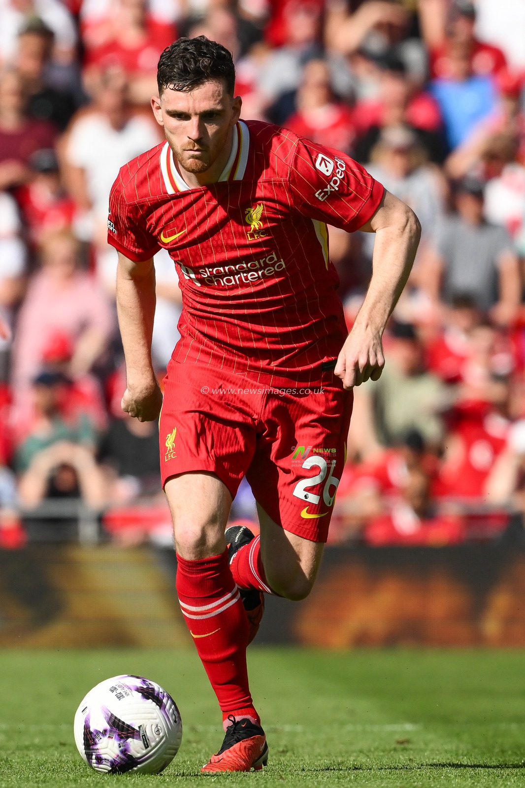 Andrew Robertson of Liverpool makes a break with the ball during the Premier League match Liverpool vs Wolverhampton Wanderers at Anfield, Liverpool, United Kingdom, 19th May 2024

(Photo by Craig Thomas/News Images)