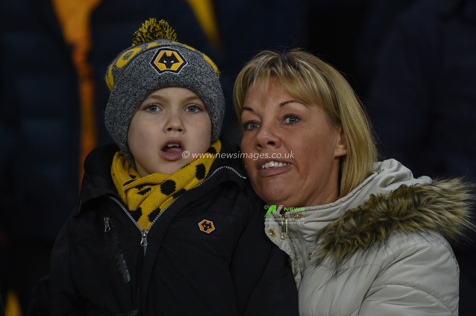 27th December 2019, Molineux, Wolverhampton, England; Premier League, Wolverhampton Wanderers v Manchester City : A young fan and his mum await the teams
Credit: Richard Long/News Images