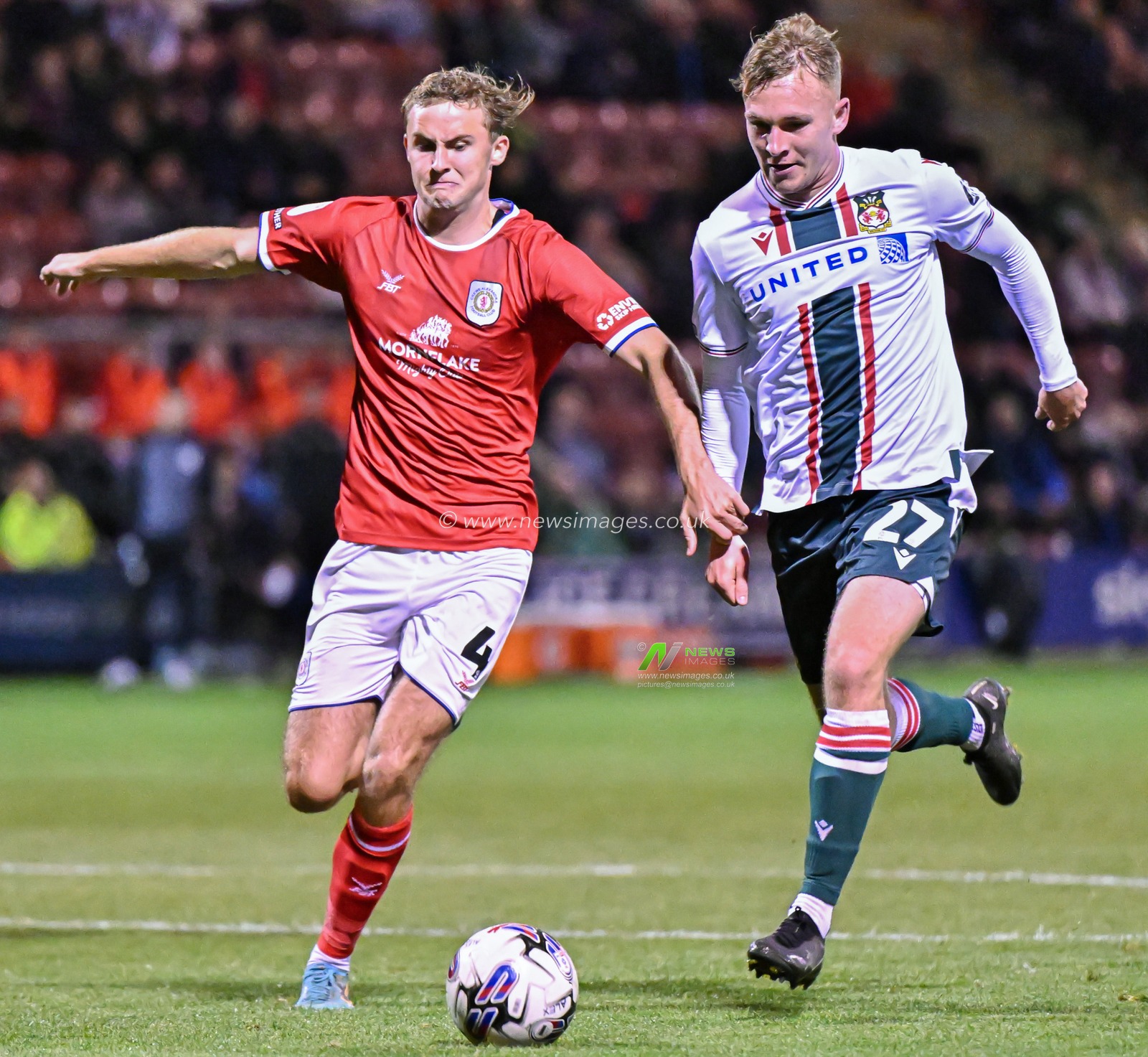 Jake Bickerstaff 27# of Wrexham Association Football Club and Zac Williams 4# of Crewe Alexandra battle for the ball, during the EFL Trophy match Crewe Alexandra vs Wrexham at Alexandra Stadium, Crewe, United Kingdom, 10th October 2023

(Photo by Cody Froggatt/News Images)