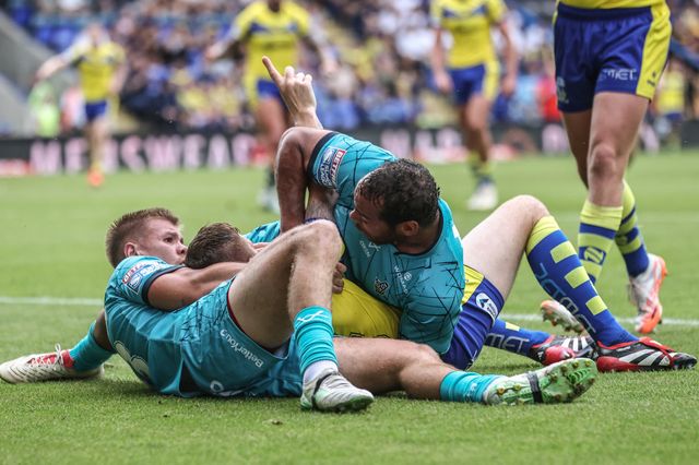 Marc Sneyd of Warrington Wolves celebrates his try during the Betfred Super League round 15 match Warrington Wolves vs Huddersfield Giants at Halliwell Jones Stadium, Warrington, United Kingdom, 21st June 2025

(Photo by Alfie Cosgrove/News Images)