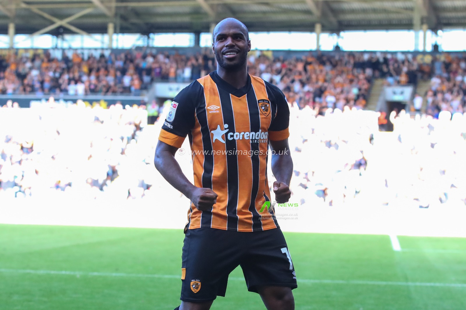 Ã“scar EstupiÃ±Ã¡n #19 of Hull City celebrates his hat-trick goal to make it 3-1