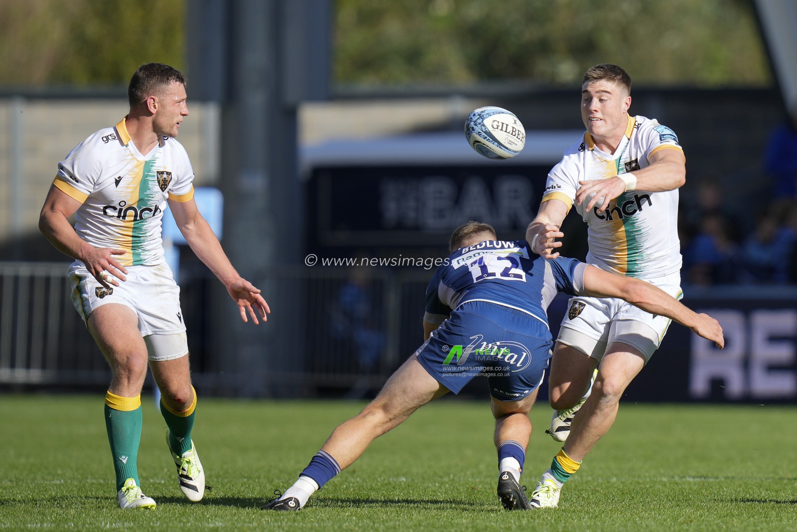 Tommy Freeman #14 of Northampton Saints passes the ball to Fraser Dingwall #13 of Northampton Saints from the tackle by Sam Bedlow #12 of Sale Sharks during the Gallagher Premiership match Sale Sharks vs Northampton Saints at AJ Bell Stadium, Eccles, United Kingdom, 15th October 2023

(Photo by Steve Flynn/News Images)