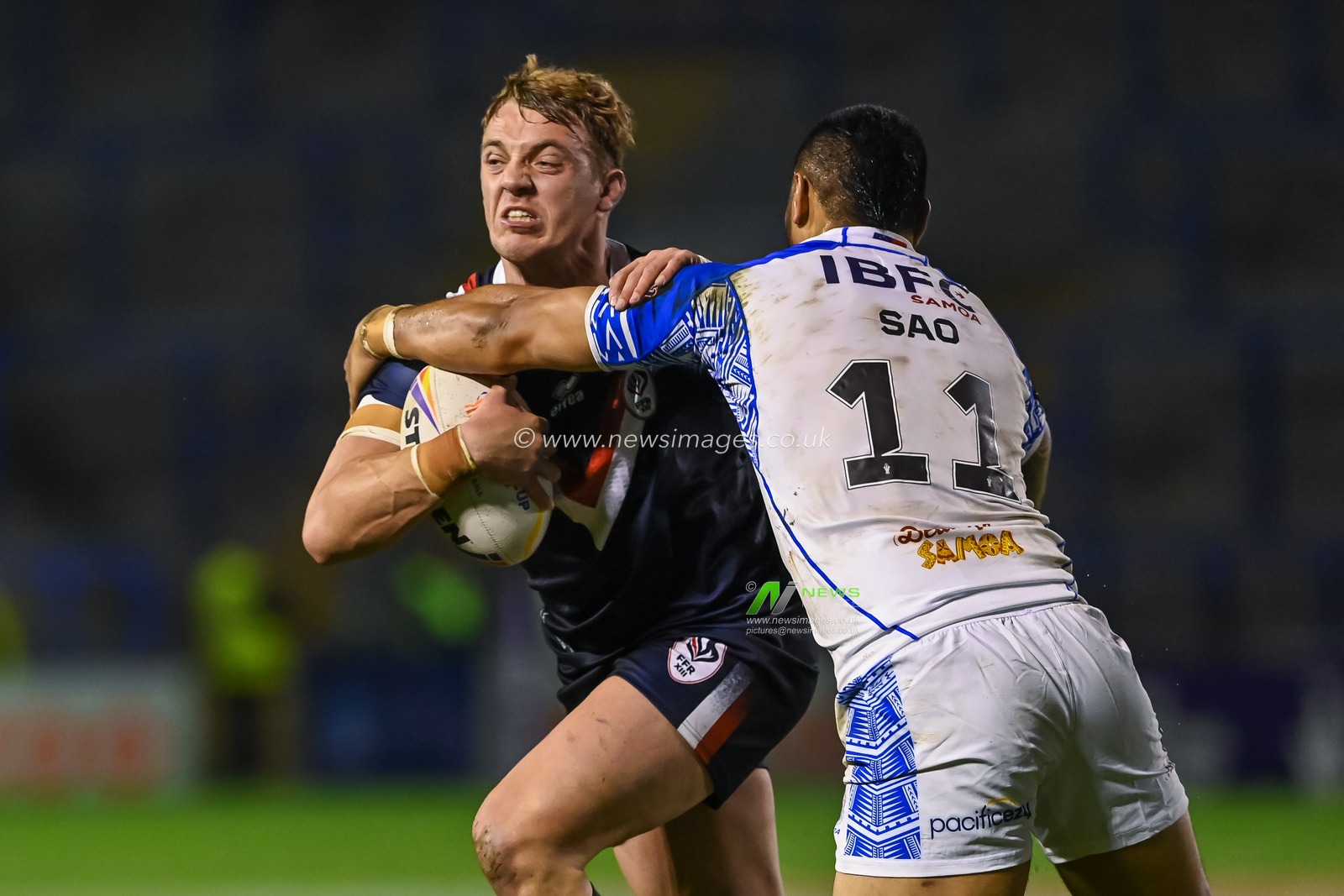 Paul SÃ©guier of France is tackled by Ligi Sao of Samoa during the Rugby League World Cup 2021 Group A match Samoa vs France at Halliwell Jones Stadium, Warrington, United Kingdom, 30th October 2022

(Photo by Craig Thomas/News Images)