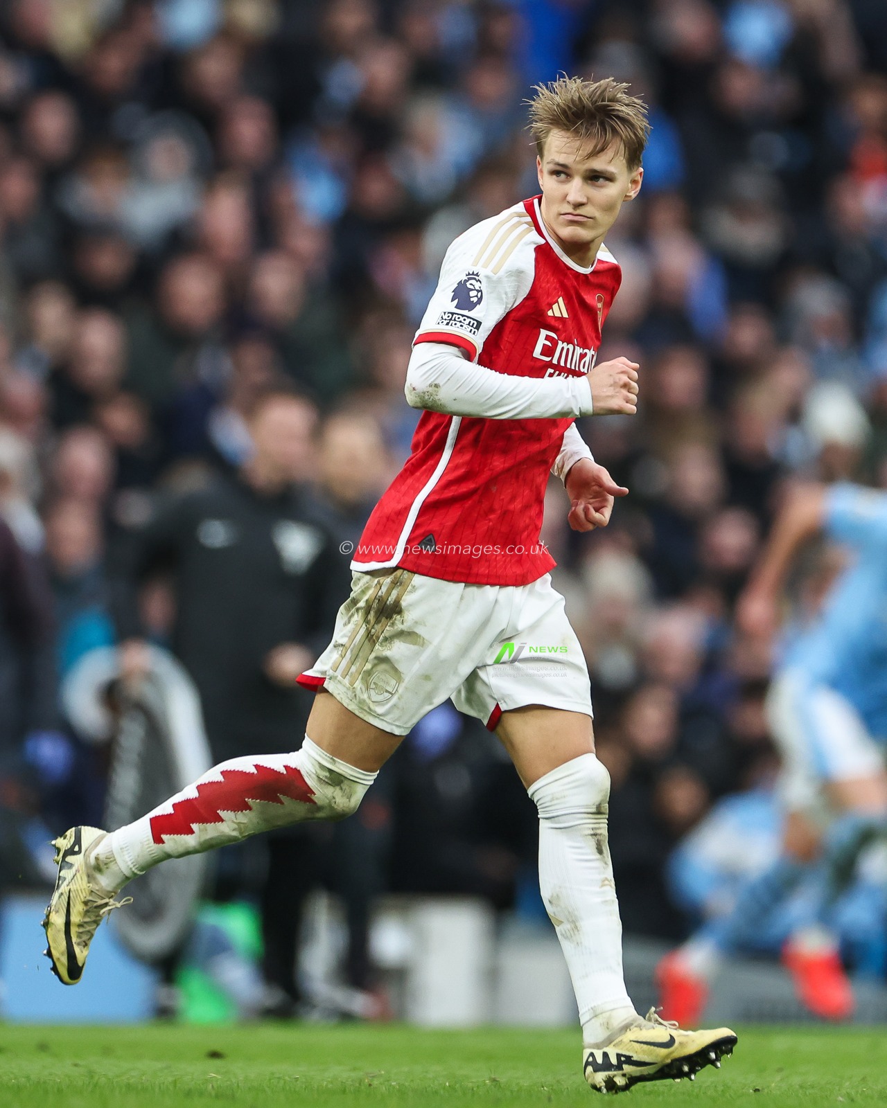 Martin Ã˜degaard of Arsenal during the Premier League match Manchester City vs Arsenal at Etihad Stadium, Manchester, United Kingdom, 31st March 2024

(Photo by Mark Cosgrove/News Images)