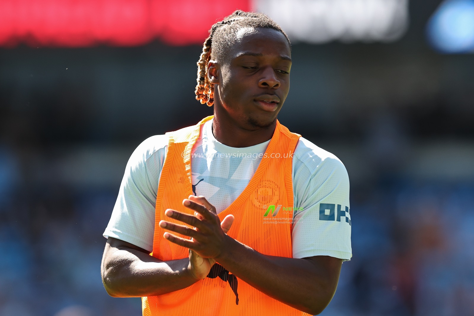 JÃ©rÃ©my Doku of Manchester City during the pre match warm up ahead of the Premier League match Manchester City vs West Ham United at Etihad Stadium, Manchester, United Kingdom, 19th May 2024

(Photo by Mark Cosgrove/News Images)