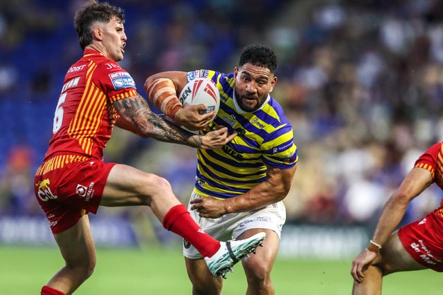 Kelepi Tanginoa of Warrington Wolves is tackled by Toby Sexton of Catalans Dragons and Guillermo Aispuro-Bichet of Catalans Dragons during the Betfred Super League round 16 match Warrington Wolves vs Catalans Dragons at The Halliwell Jones Stadium, Warrington, United Kingdom on 25 June 2026

(Photo by Alfie Cosgrove/News Images)