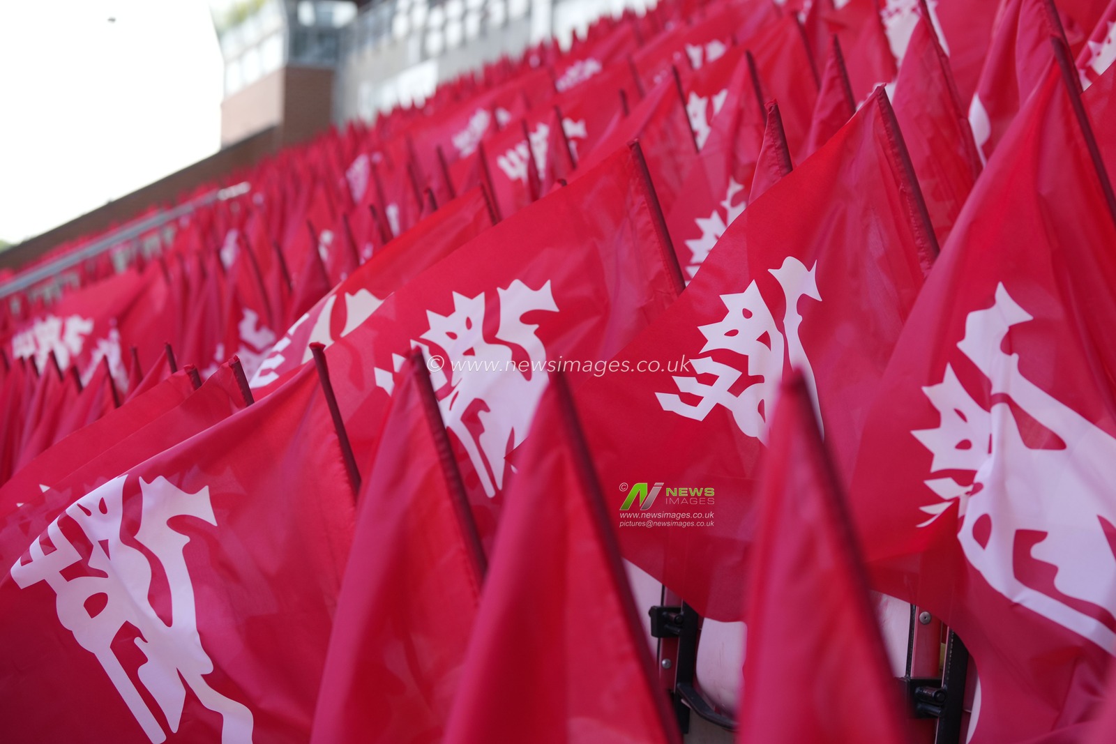 A general view of flags laid out on the seats of the Leigh Sports Village Stadium, home of Manchester United Women before the The FA Women's Super League match Manchester United Women vs Manchester City Women at Leigh Sports Village, Leigh, United Kingdom, 21st May 2023

(Photo by Steve Flynn/News Images)