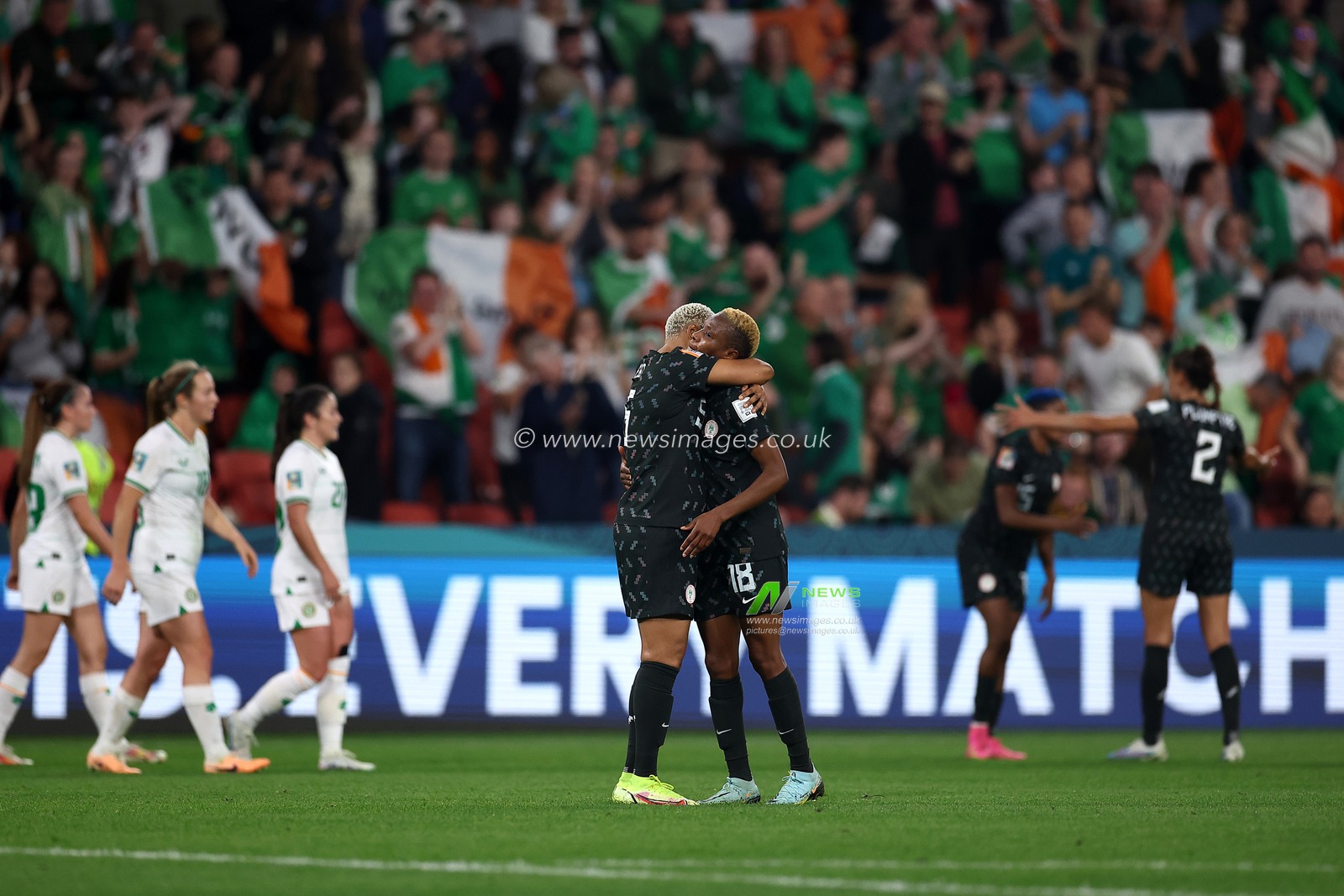 Halimatu Ayinde of Nigeria and Onome Ebi of Nigeria
 emabrace after the FIFA Women's World Cup 2023 Group B  match Ireland Women vs Nigeria Women at Suncorp Stadium, Brisbane, Australia, 31st July 2023

(Photo by Patrick Hoelscher/News Images)