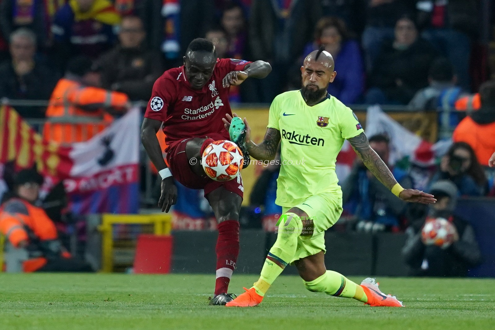 Liverpool's Sadio Mane under pressure from Barcelona's Arturo Vidal

7th Mayl 2019 , Anfield Stadium, Liverpool, England;  UEFA Champions League Semi Final, Second Leg, Liverpool FC vs FC Barcelona 

Credit: Terry Donnelly/News Images