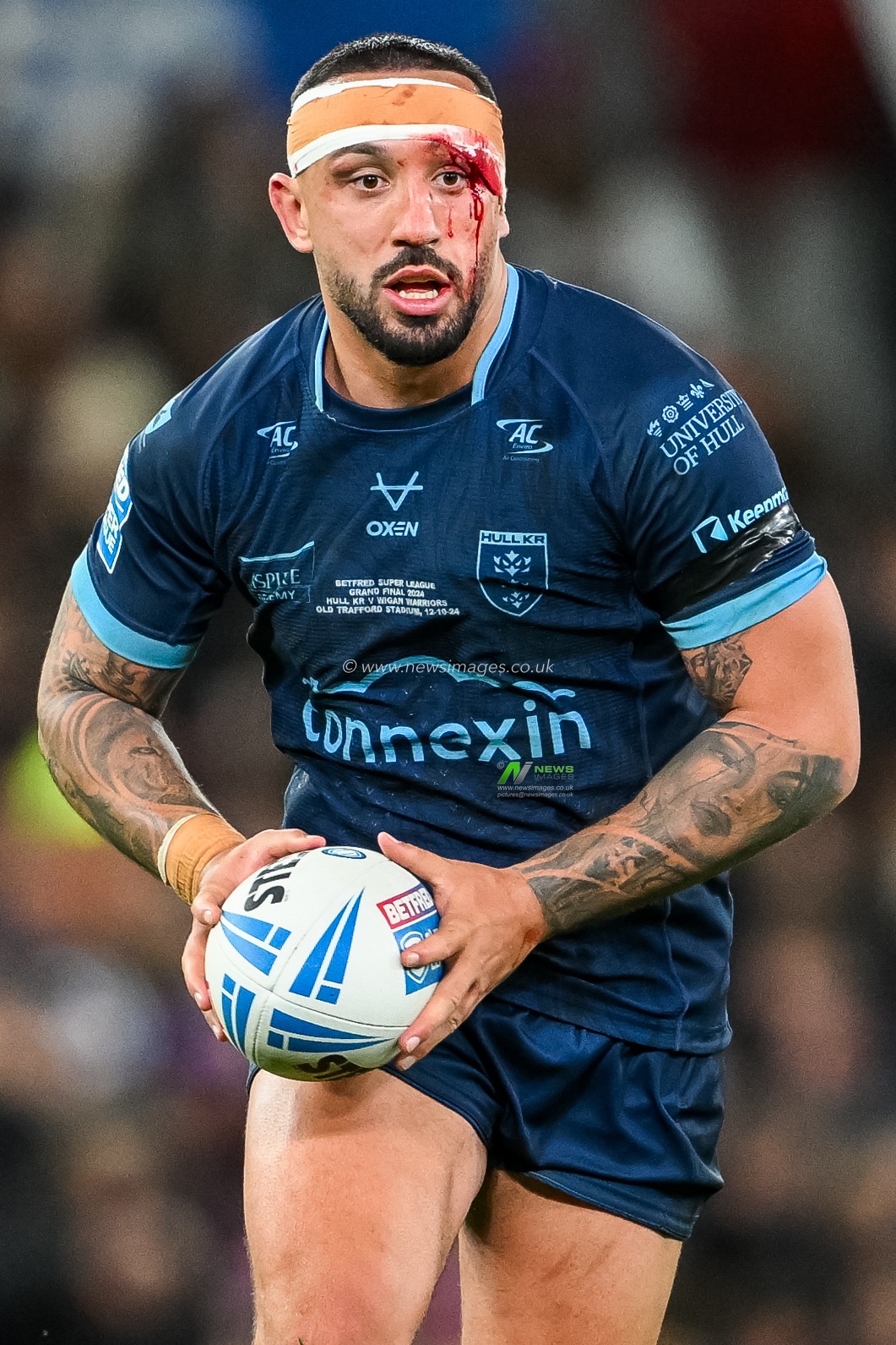 Elliot Minchella of Hull KR runs with the ball during the Betfred Super League Grand Final match Wigan Warriors vs Hull KR at Old Trafford, Manchester, United Kingdom, 12th October 2024

(Photo by Craig Thomas/News Images)