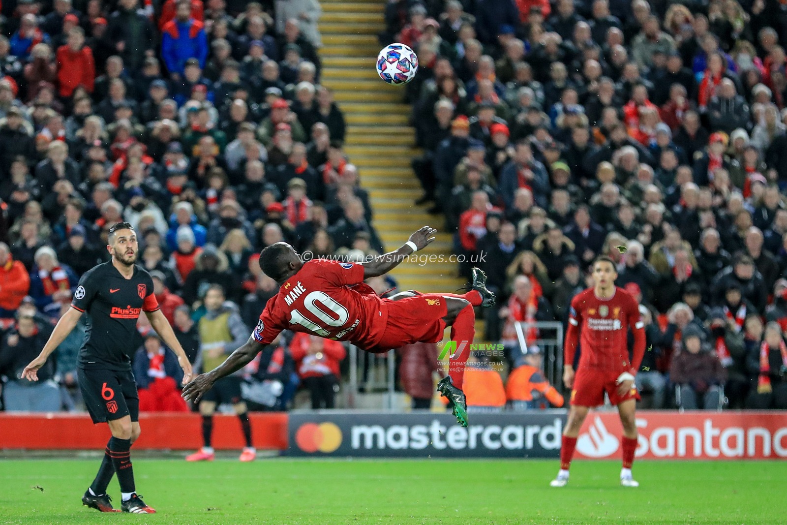 11th March 2020, Anfield, Liverpool, England; UEFA Champions League, Round of 16 Leg 2 of 2, Liverpool v Atletico Madrid : Sadio Mane (10) of Liverpool tires an overhead kick that just tips over the crossbar