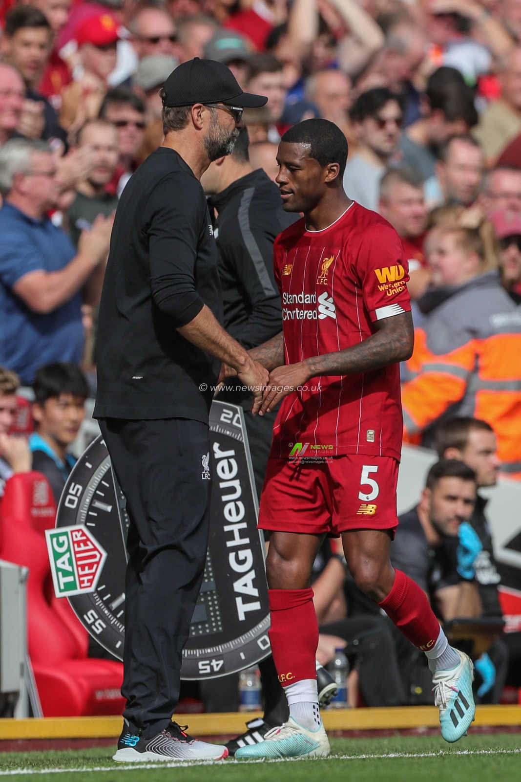 14th September 2019 , Anfield, Liverpool, England; Premier League Football, Liverpool vs Newcastle United ; Jurgen Klopp manager of Liverpool shakes Georginio Wijnaldum (5) of Liverpoolâ€™s hand as heâ€™s substituted 


Credit: Mark Cosgrove/News Images 


Premier League/EFL Football images are subject to DataCo Licence