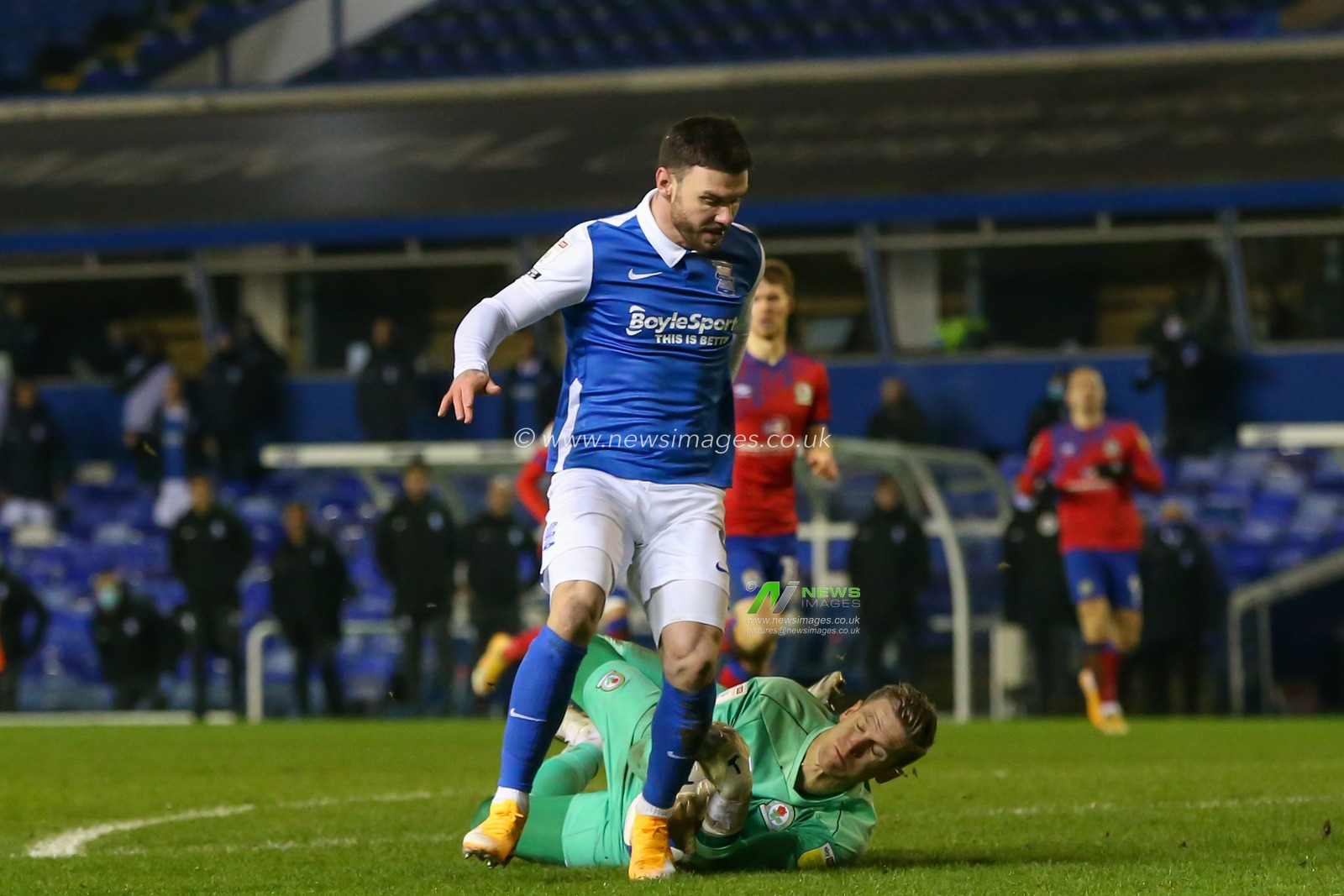 Scott Hogan #9 of Birmingham City sees his shot saved by Thomas Kaminski #1 of Blackburn Rovers