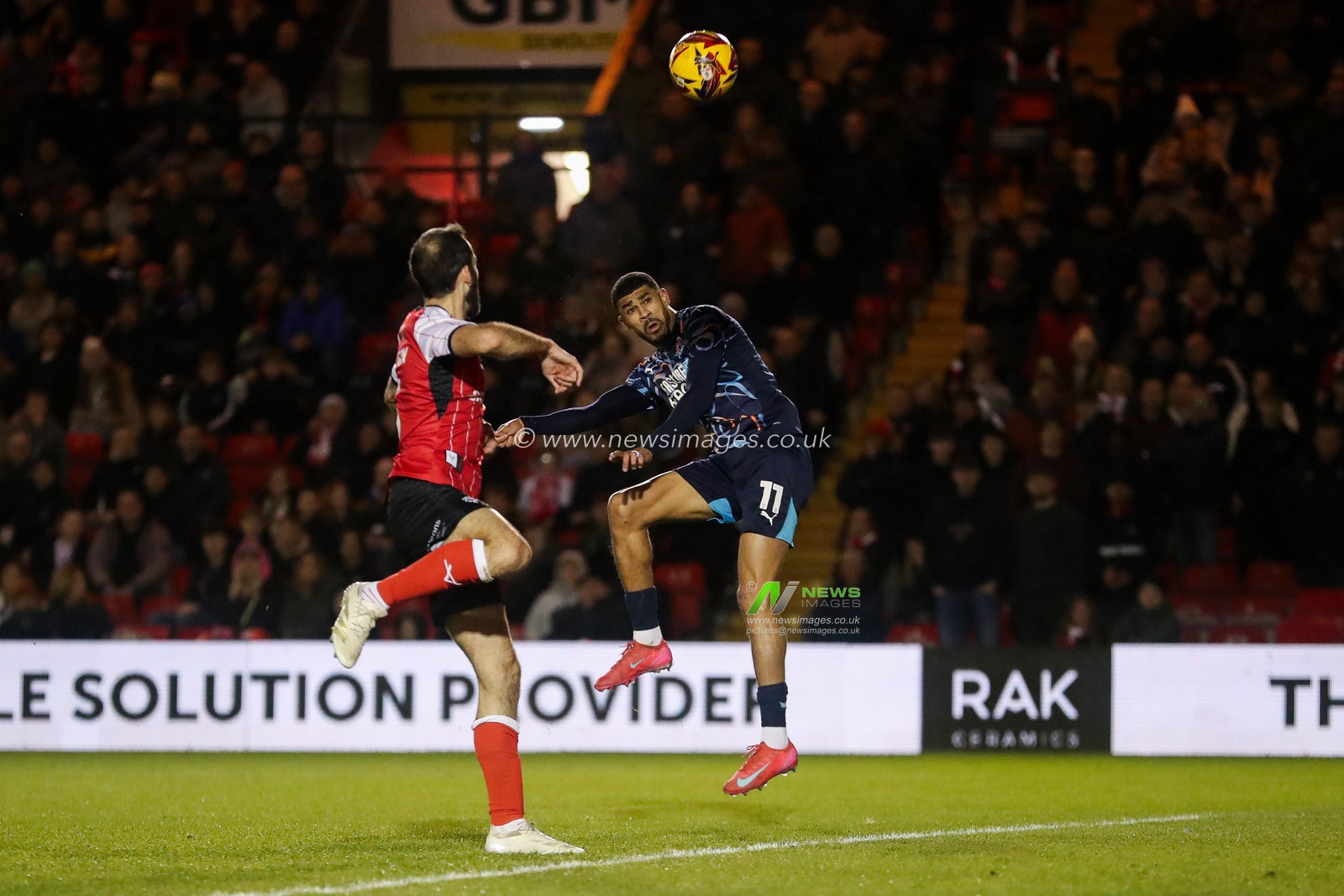 Ashley Fletcher of Blackpool heads the ball during the Sky Bet League 1 match Lincoln City vs Blackpool at Gelder Group Sincil Bank Stadium, Lincoln, United Kingdom, 28th January 2025

(Photo by Izzy Poles/News Images)