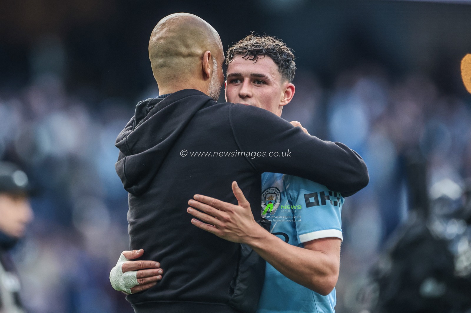 Pep Guardiola manager of Manchester City embraces Phil Foden of Manchester City after the game during the Premier League match Manchester City vs Manchester United at Etihad Stadium, Manchester, United Kingdom, 14th September 2025

(Photo by Mark Cosgrove/News Images)