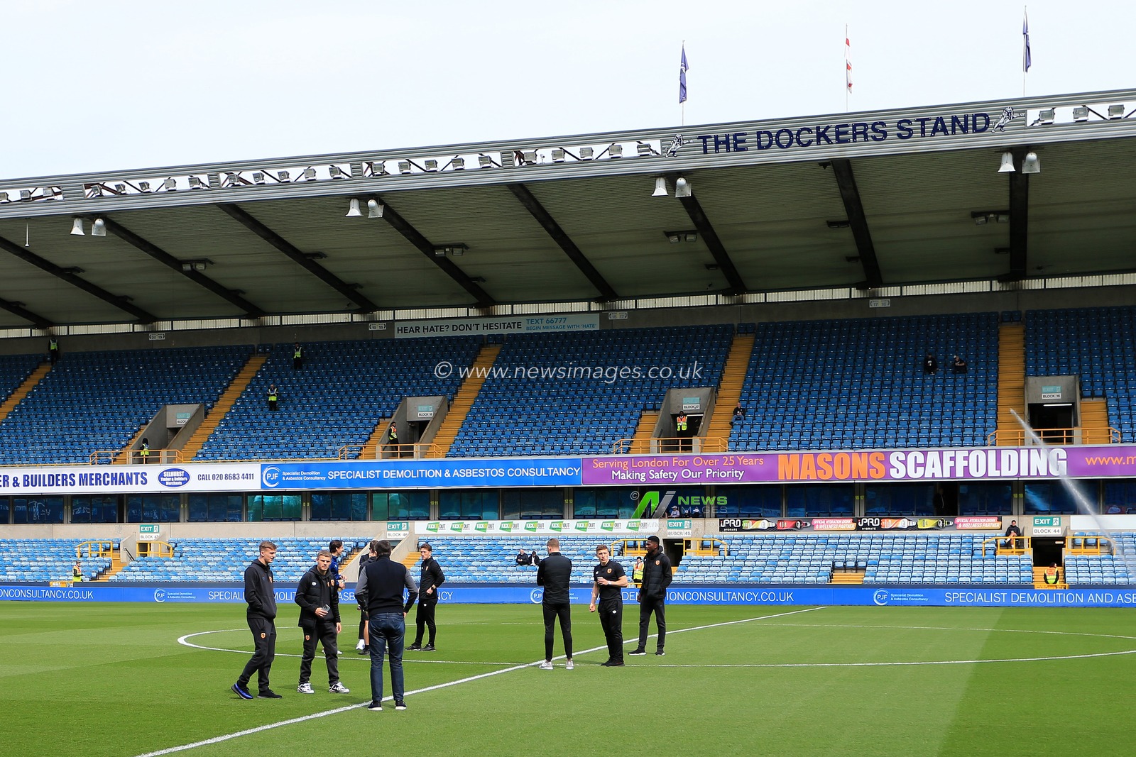 Shota Arveladze manager of Hull City and Hull City players inspect the pitch.