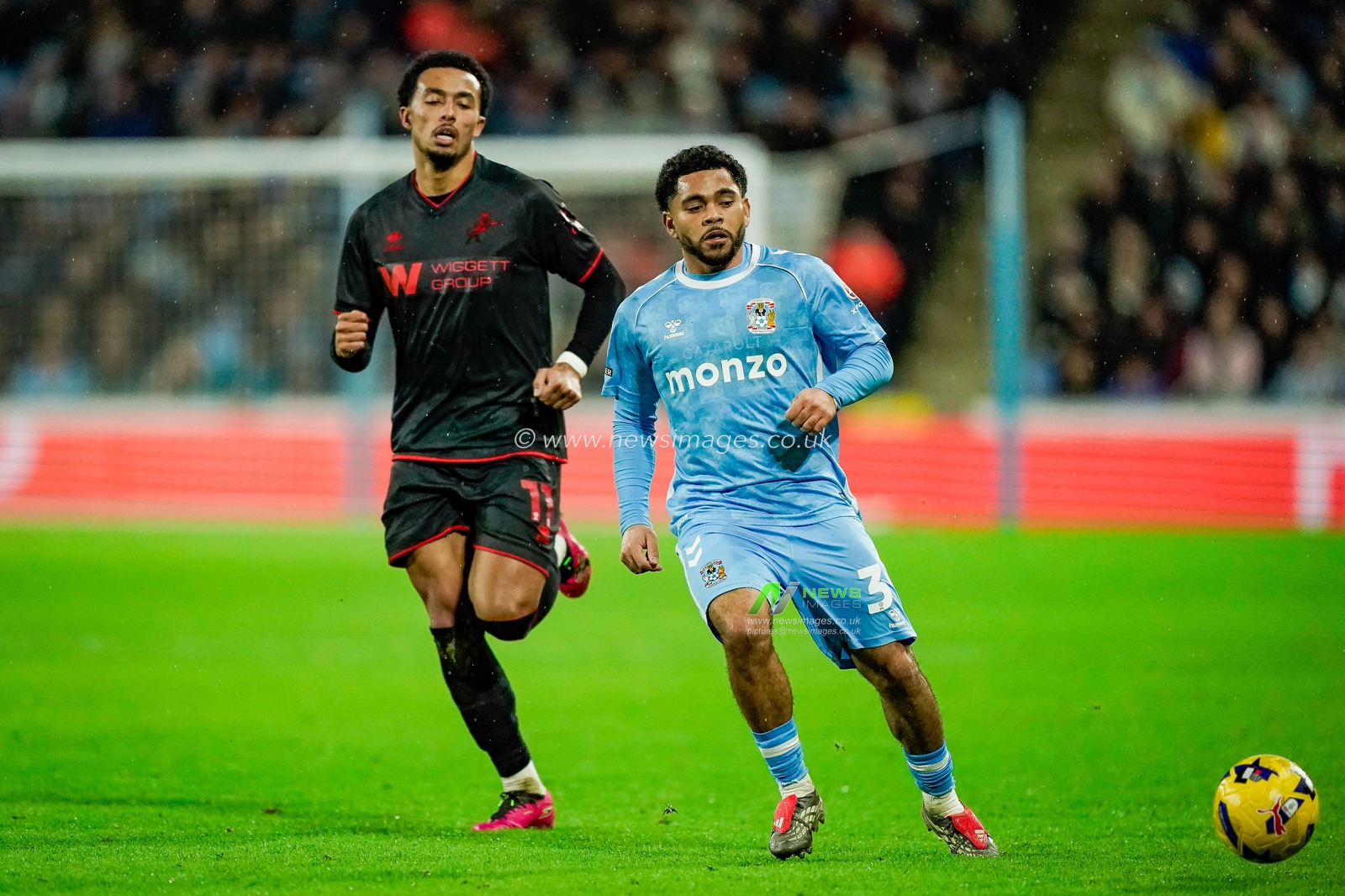 Jay Dasilva of Coventry City makes a run with the ball  while chased by Femi Azeez of Millwall during the Sky Bet Championship match Coventry City vs Millwall at Coventry Building Society Arena, Coventry, United Kingdom, 20th January 2026

(Photo by Maynard Manyowa/News Images)