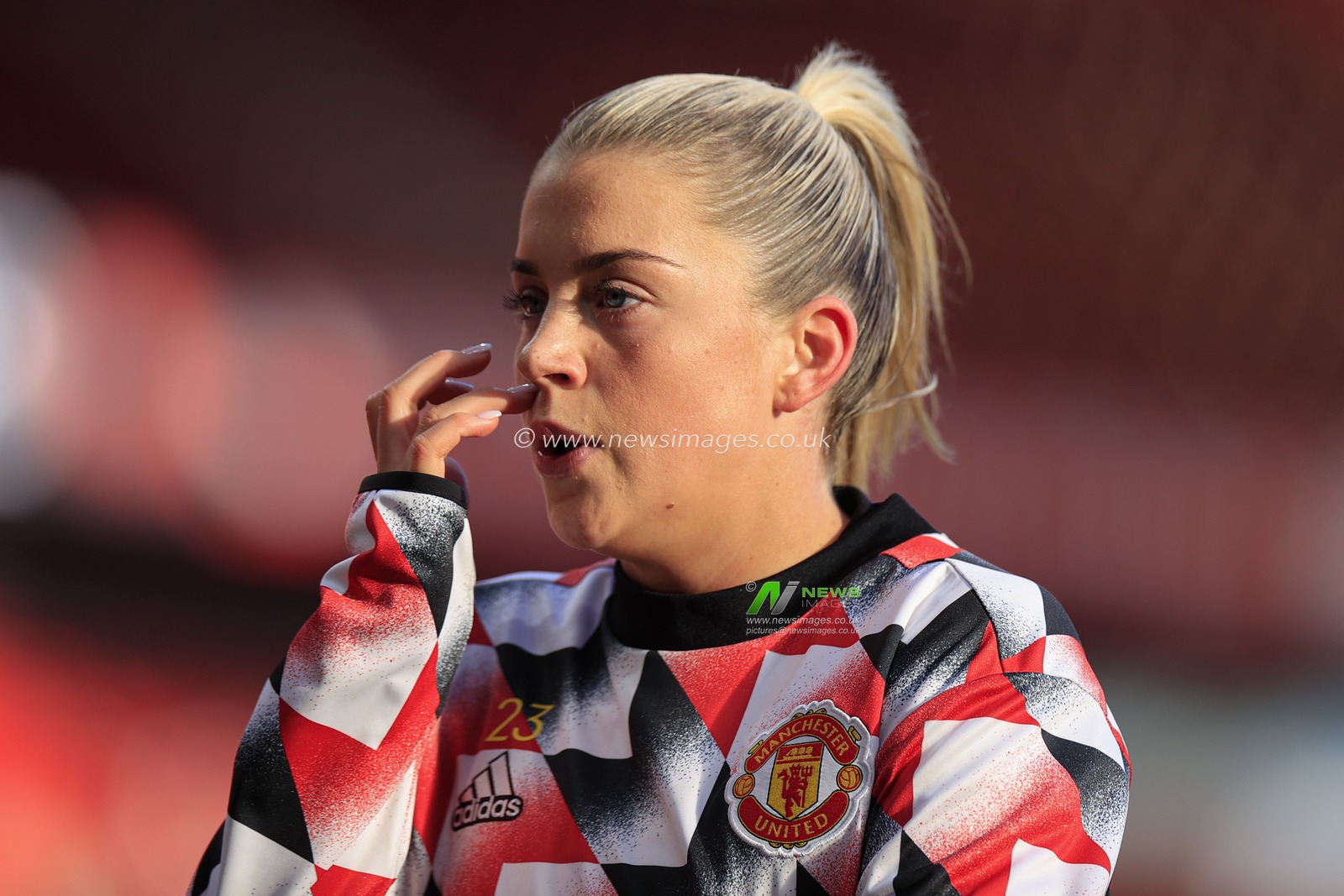 Alessia Russo #23 of Manchester United during the warm up ahead of The FA Women's Super League match Manchester United Women vs Aston Villa Women at Old Trafford, Manchester, United Kingdom, 3rd December 2022

(Photo by Conor Molloy/News Images)
