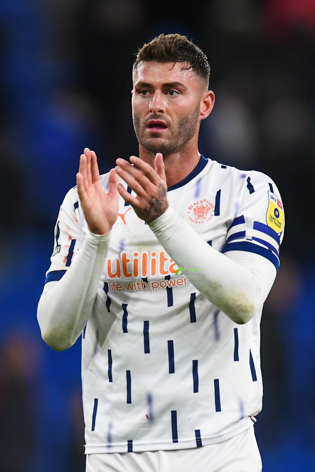 Gary Madine #14 of Blackpool  Applauds the travelling supporters during the Sky Bet Championship match Cardiff City vs Blackpool at Cardiff City Stadium, Cardiff, United Kingdom, 17th December 2022

(Photo by Mike Jones/News Images)