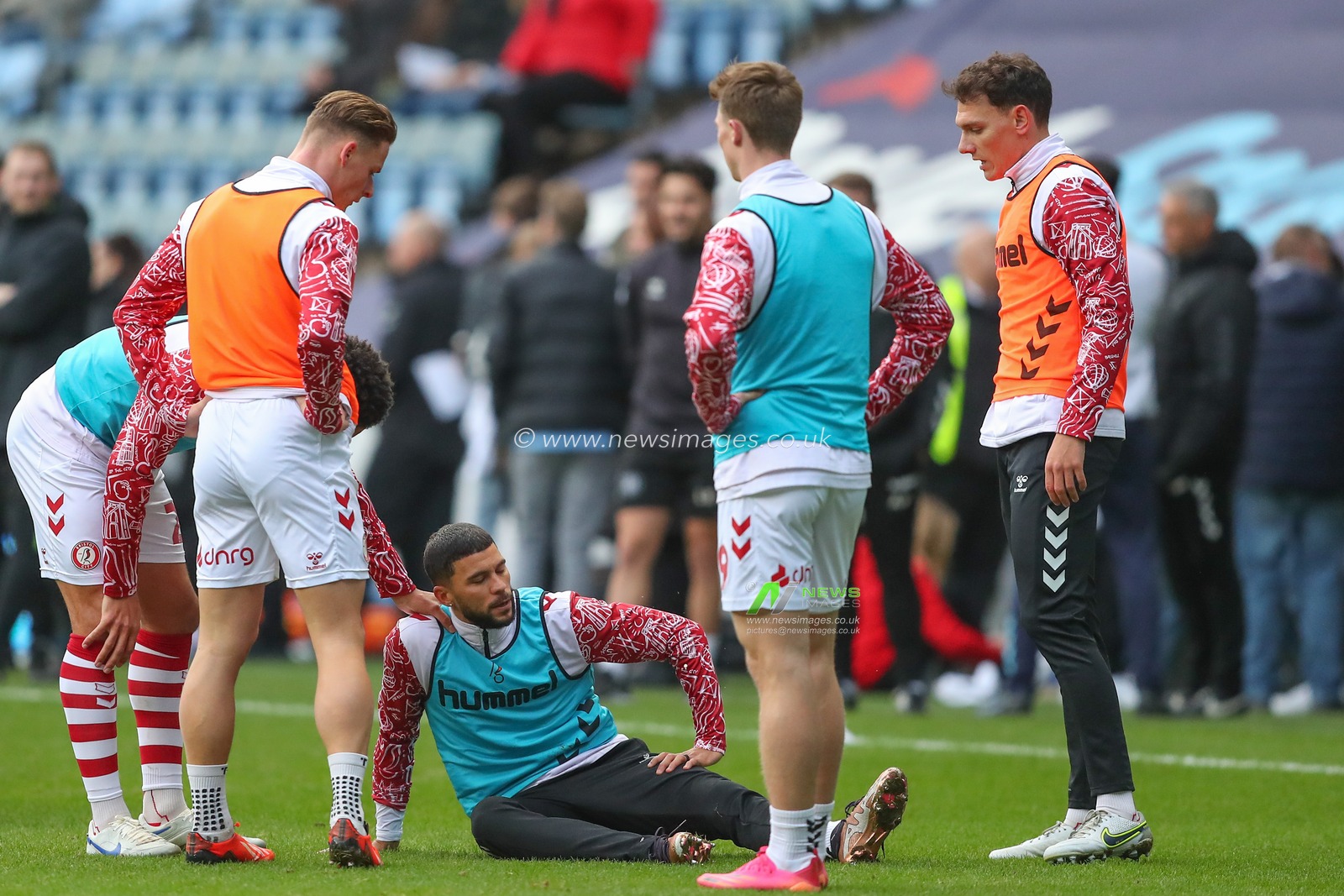 Nahki Wells #21 of Bristol City goes down holding his upper leg during the pre-game warm up ahead of the Sky Bet Championship match Coventry City vs Bristol City at Coventry Building Society Arena, Coventry, United Kingdom, 1st January 2023

(Photo by Gareth Evans/News Images)