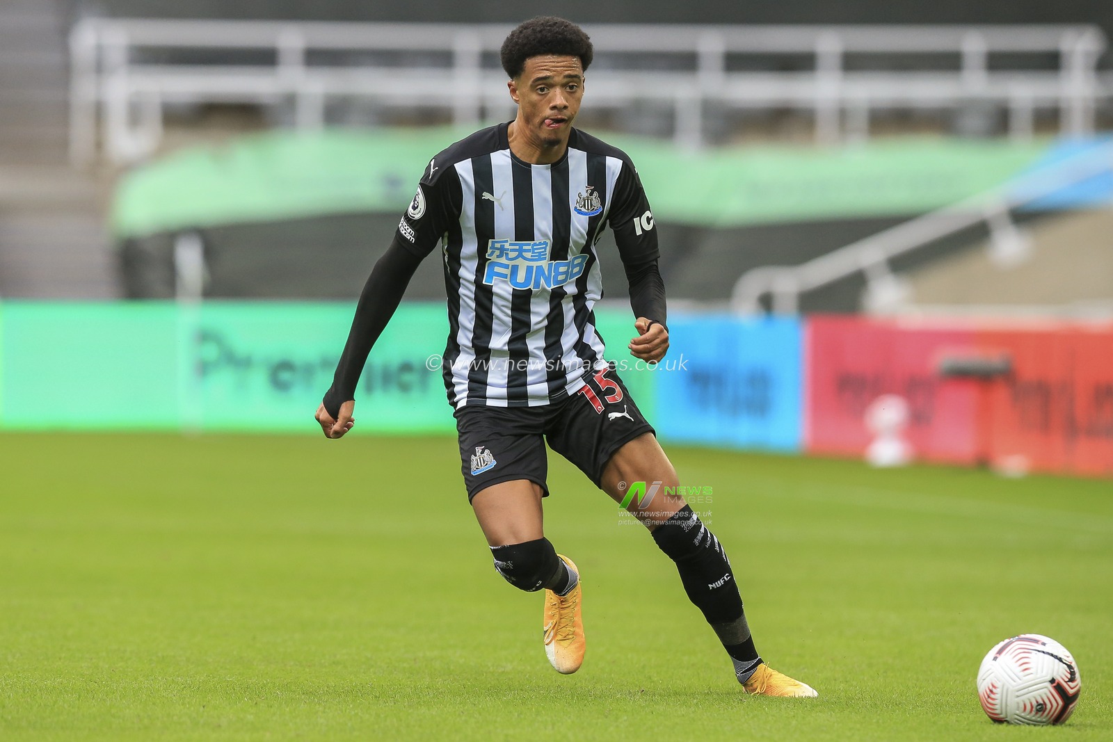 Jamal Lewis (15) of Newcastle United in possession of the ball