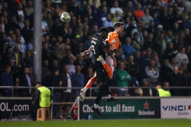 Jake Beesley of Blackpool flicks the ball on during the Carabao Cup match Blackpool vs Sheffield Wednesday at Bloomfield Road, Blackpool, United Kingdom, 17th September 2024

(Photo by Gareth Evans/News Images)