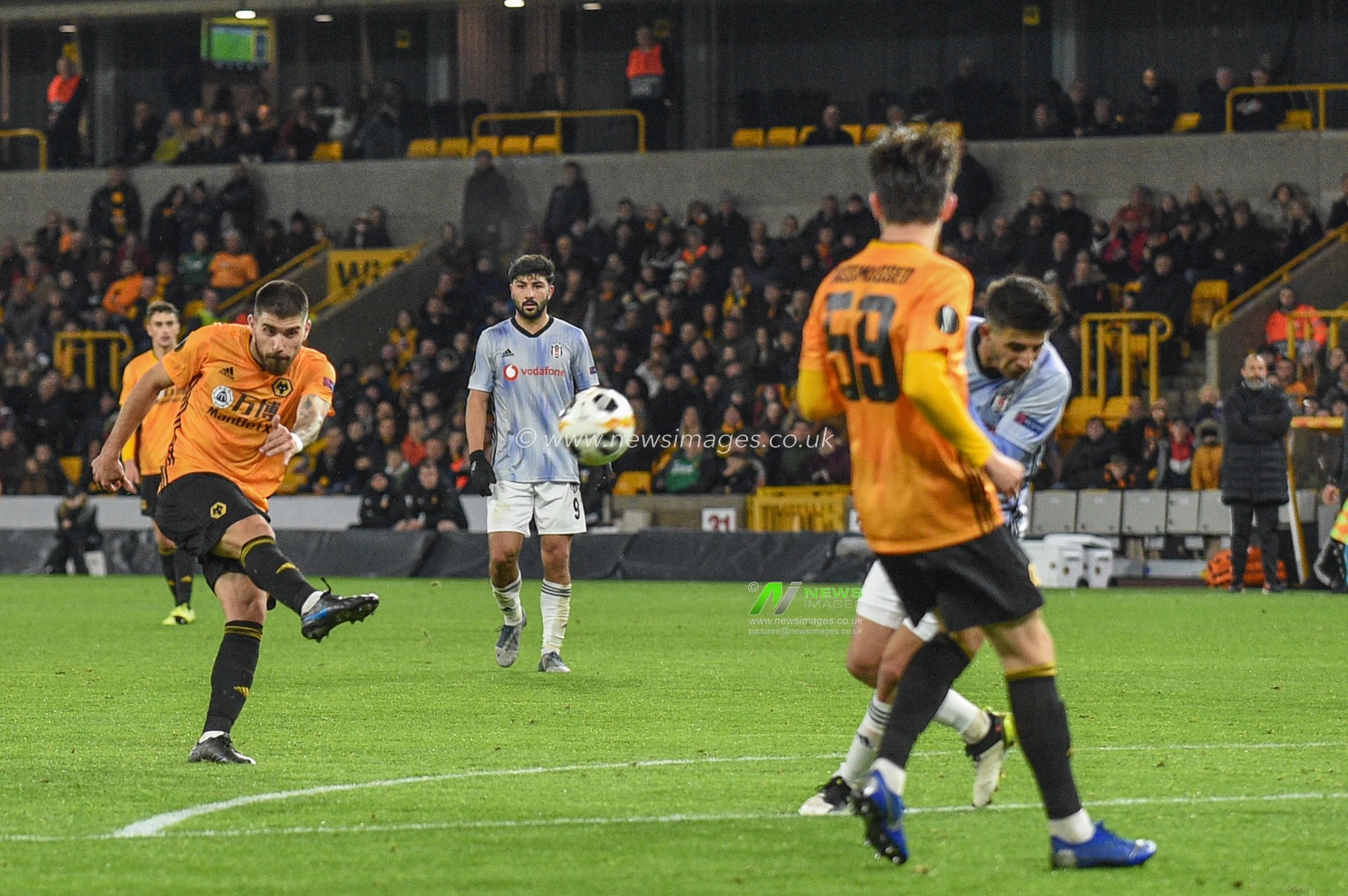 12th December 2019, Molineux, Wolverhampton, England; UEFA Europa League, Wolverhampton Wanderers v Besiktas : Ruben Neves (8) of Wolverhampton Wanderers shoots on goal 

Credit: Richard Long/News Images
