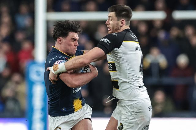 Brodie Croft of Leeds Rhinosis tackled by Sam Wood of York Knights during the Betfred Super League Round 2 match Leeds Rhinos vs York Knights at AMT Headingley Stadium, Leeds, United Kingdom on 20 February 2026

(Photo by Mark Cosgrove/News Images)