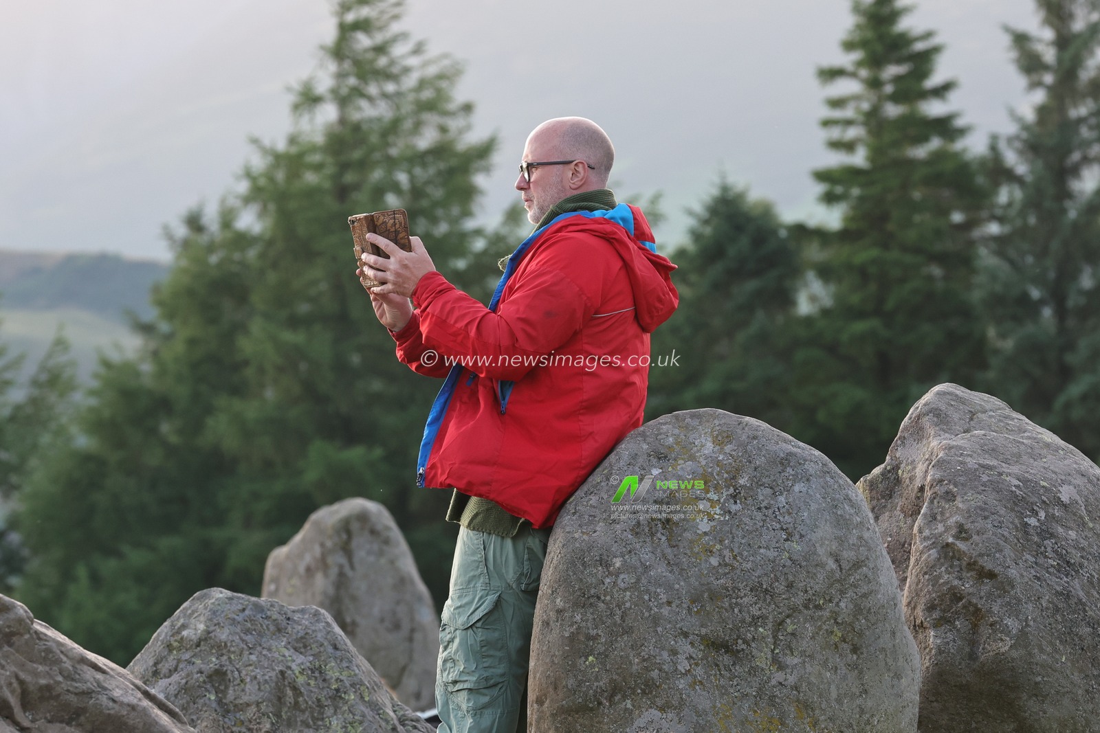 People arrive at Castlerigg Stone Circle Summer Solstice Celebration. It's believed Castlerigg Stone Circle was constructed around 3200 BC, and although its original purpose remains largely unknown, possible uses include a trading post, meeting place, a religious site or an astronomical observatory.Castlerigg Stone Circle, Keswick, United Kingdom, 20th June 2023

(Photo by Alfie Cosgrove/News Images)