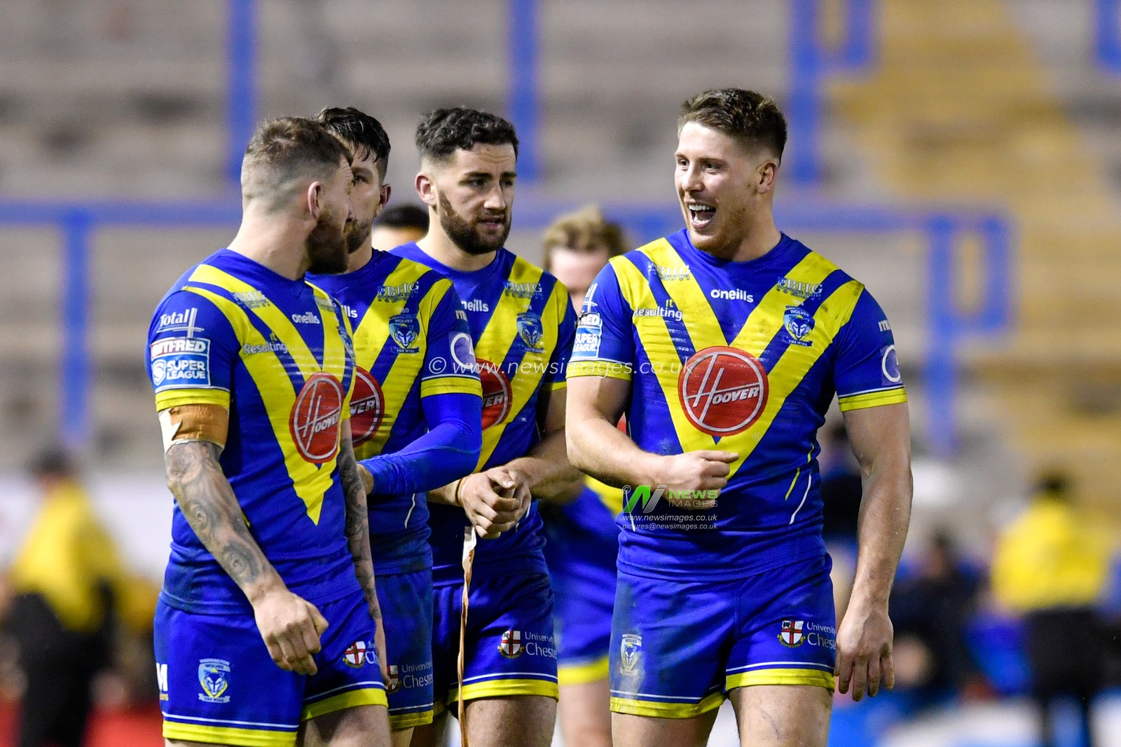 21st February 2020, Halliwell Jones Stadium, Warrington, England; Betfred Super League, Warrington Wolves v Toronto Wolfpack : Tom Lineham (2) of Warrington Wolves shares a joke with his team mates after the final whistle