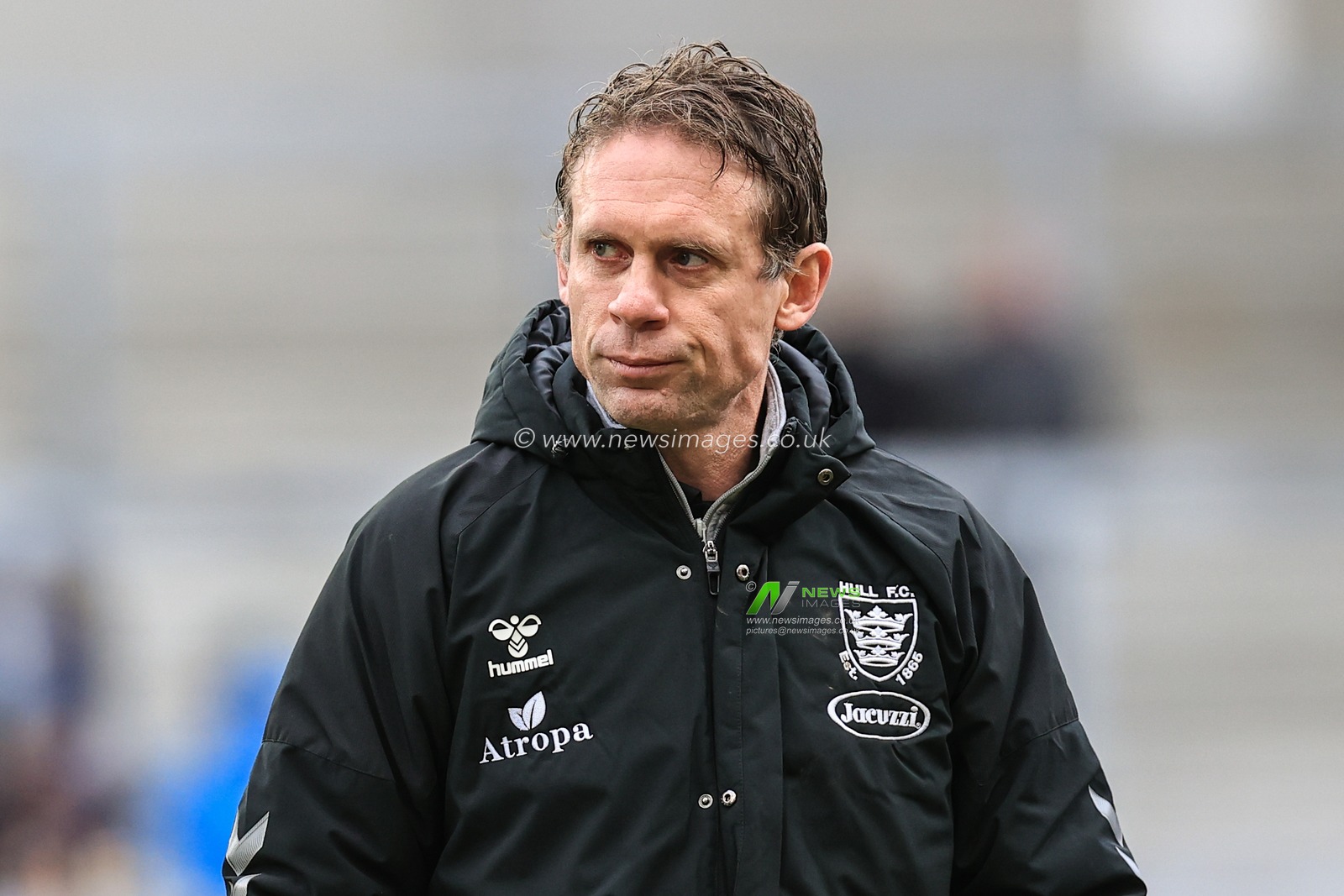 Brett Hodgson head coach of Hull FC walks on to inspect the pitch