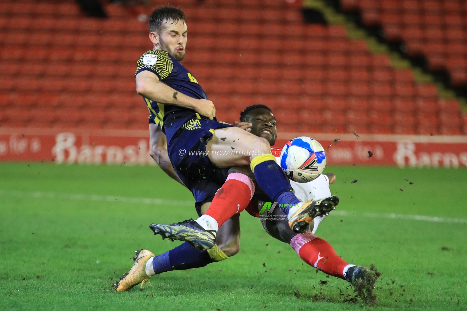 Daryl Dike #10 of Barnsley misses a great chance inside Stokes area