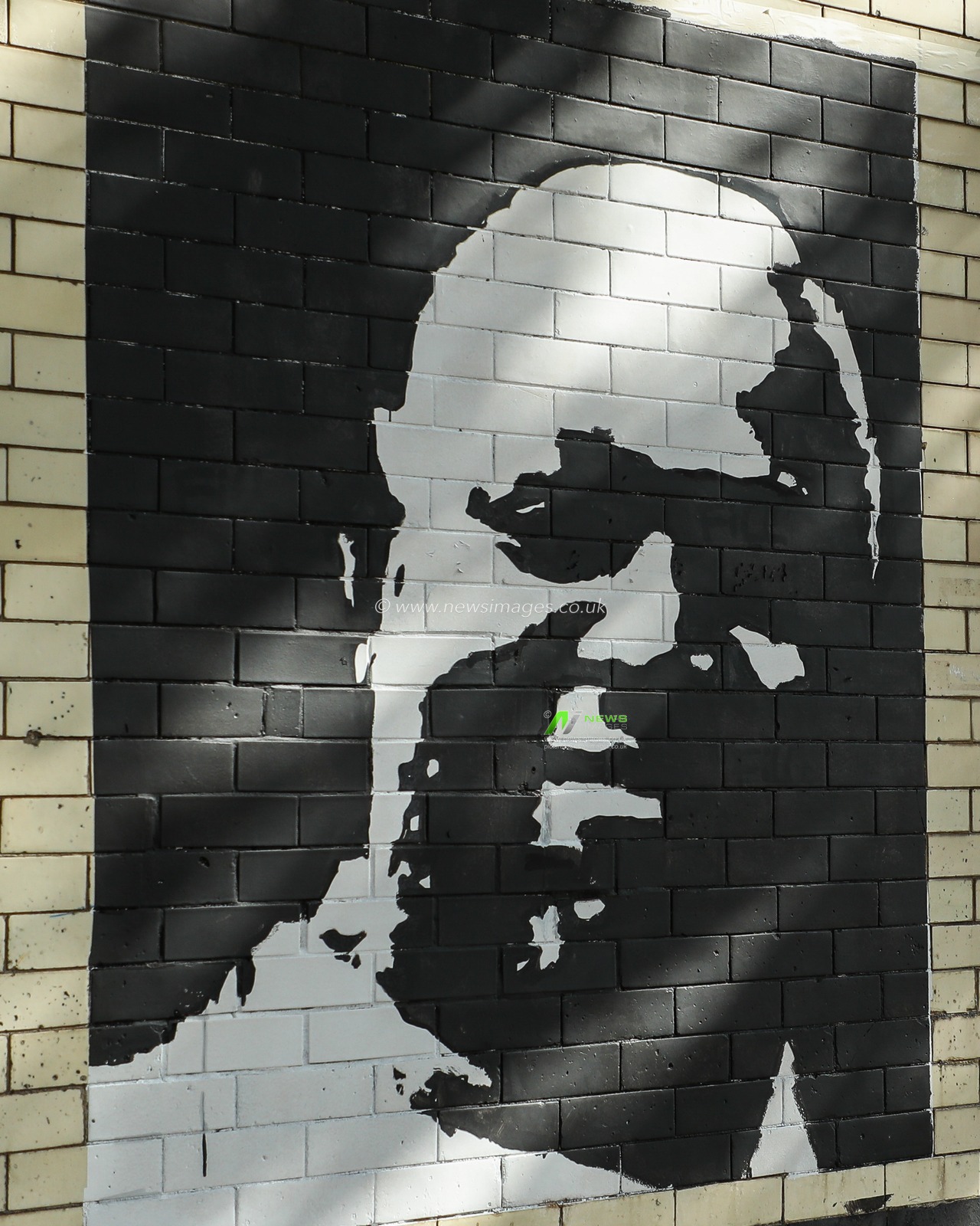 â€˜The North Banksyâ€™ paints a mural of Denton Connell on the 17th anniversary of his death prior to the Premier League match Arsenal vs Southampton at Emirates Stadium, London, United Kingdom, 5th October 2024

(Photo by Izzy Poles/News Images)