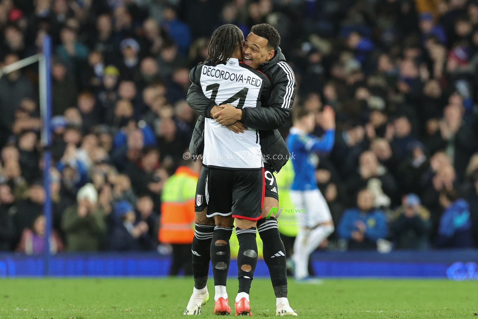 Bobby Reid of Fulham and Rodrigo Muniz of Fulham embrace after the Carabao Cup Quarter Final match Everton vs Fulham at Goodison Park, Liverpool, United Kingdom, 19th December 2023

(Photo by Mark Cosgrove/News Images)