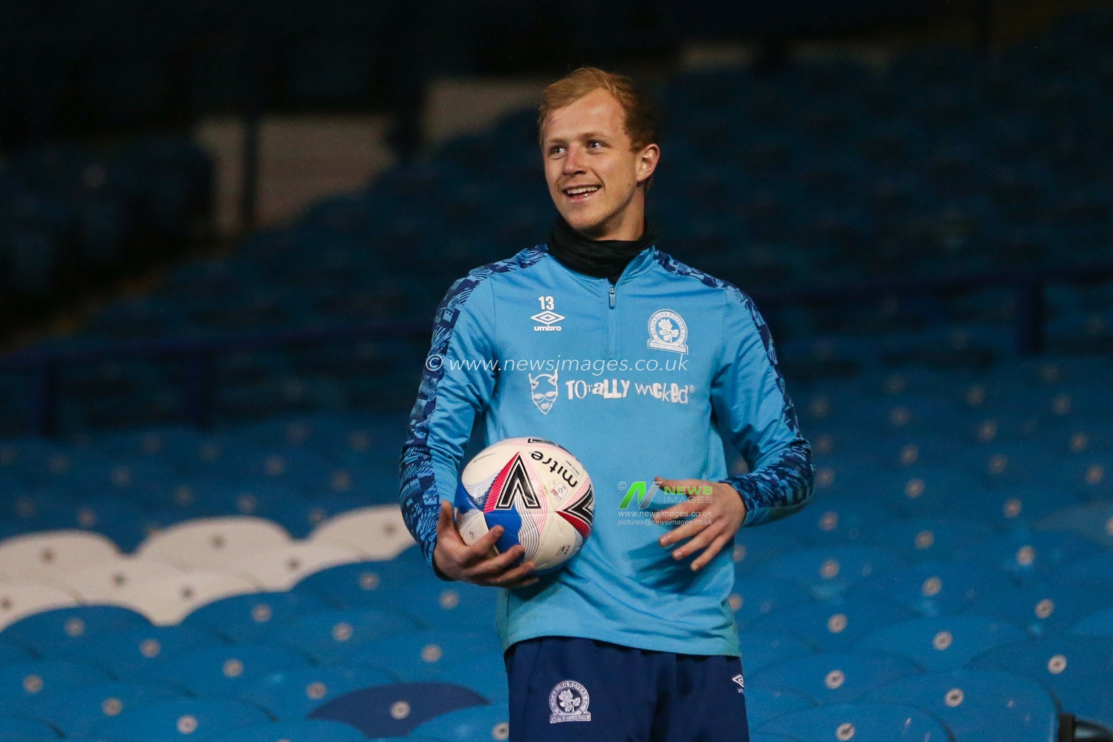 Aynsley Pears #13 of Blackburn Rovers looks for a ball in the stand at half time