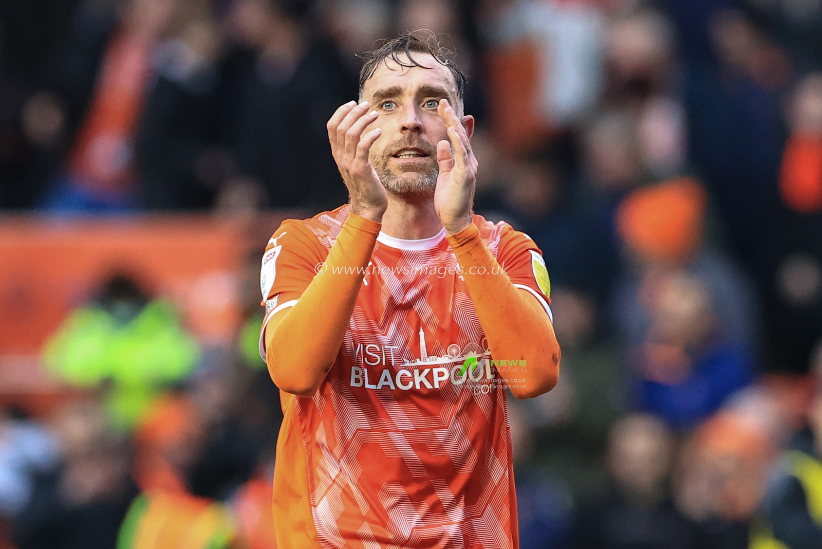 Richard Keogh #26 of Blackpool celebrates Blackpoolâ€™s 2-0 win over Preston