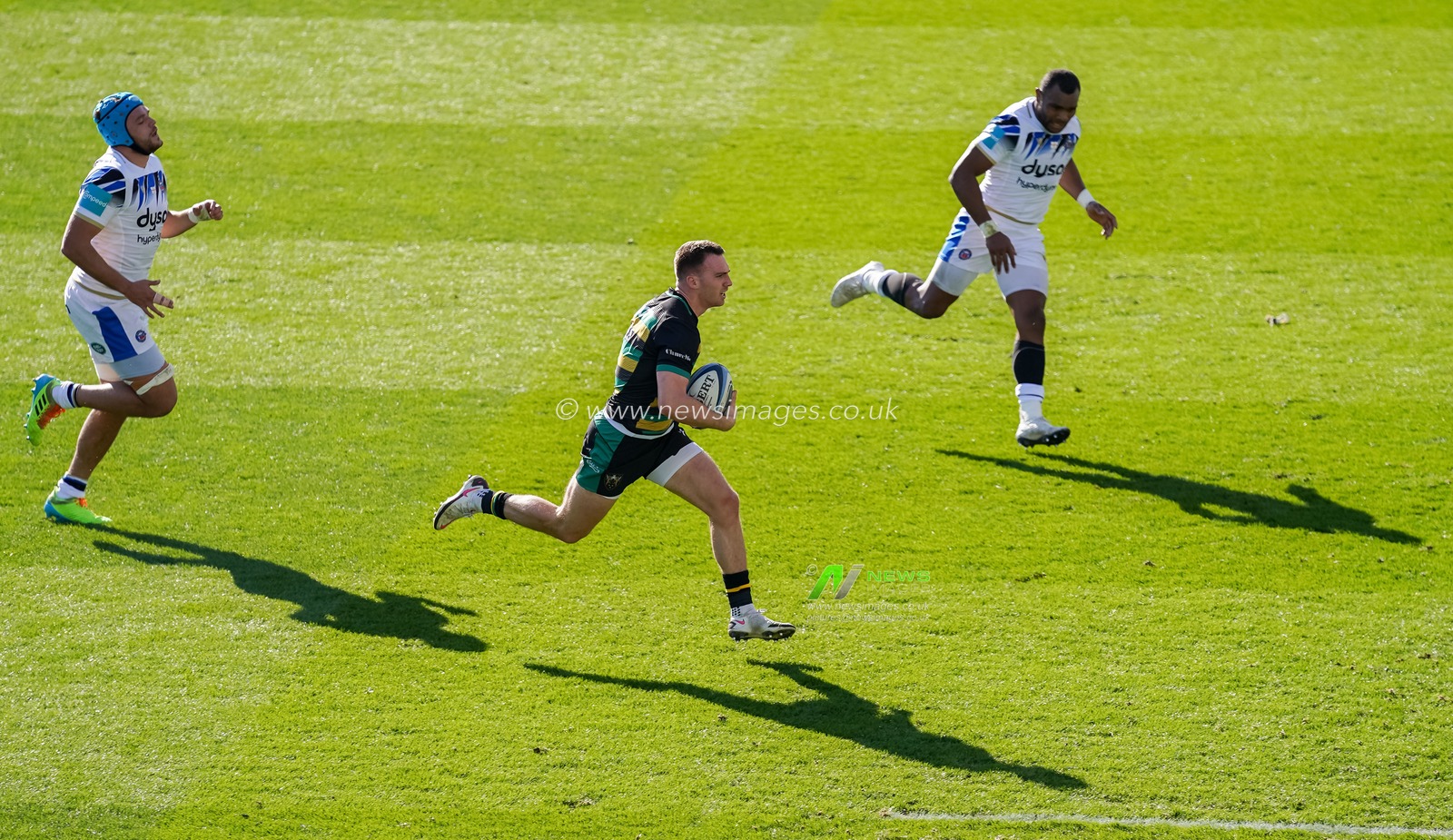 Tom James #9 of Northampton Saints scores his second try and Northants second of the game