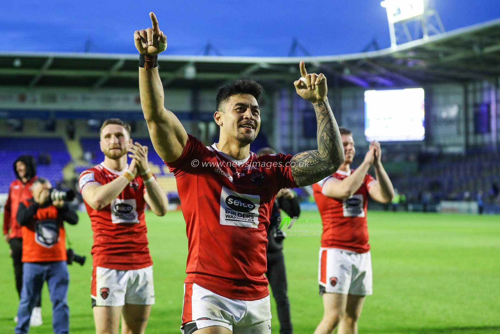 Tim Lafai of Salford Red Devils celebrates his teams win after the Betfred Super League Round 14 match Warrington Wolves vs Salford Red Devils at Halliwell Jones Stadium, Warrington, United Kingdom, 14th June 2024

(Photo by Gareth Evans/News Images)